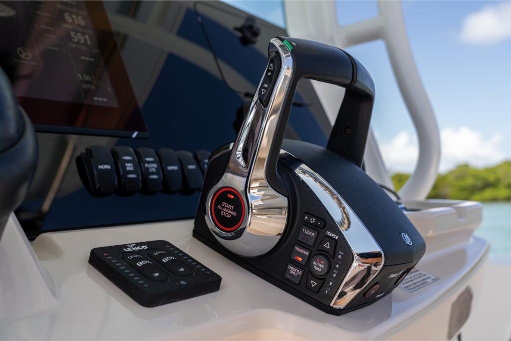 Close-up of the 2024 Boston Whaler 280 Dauntless control panel and throttle.