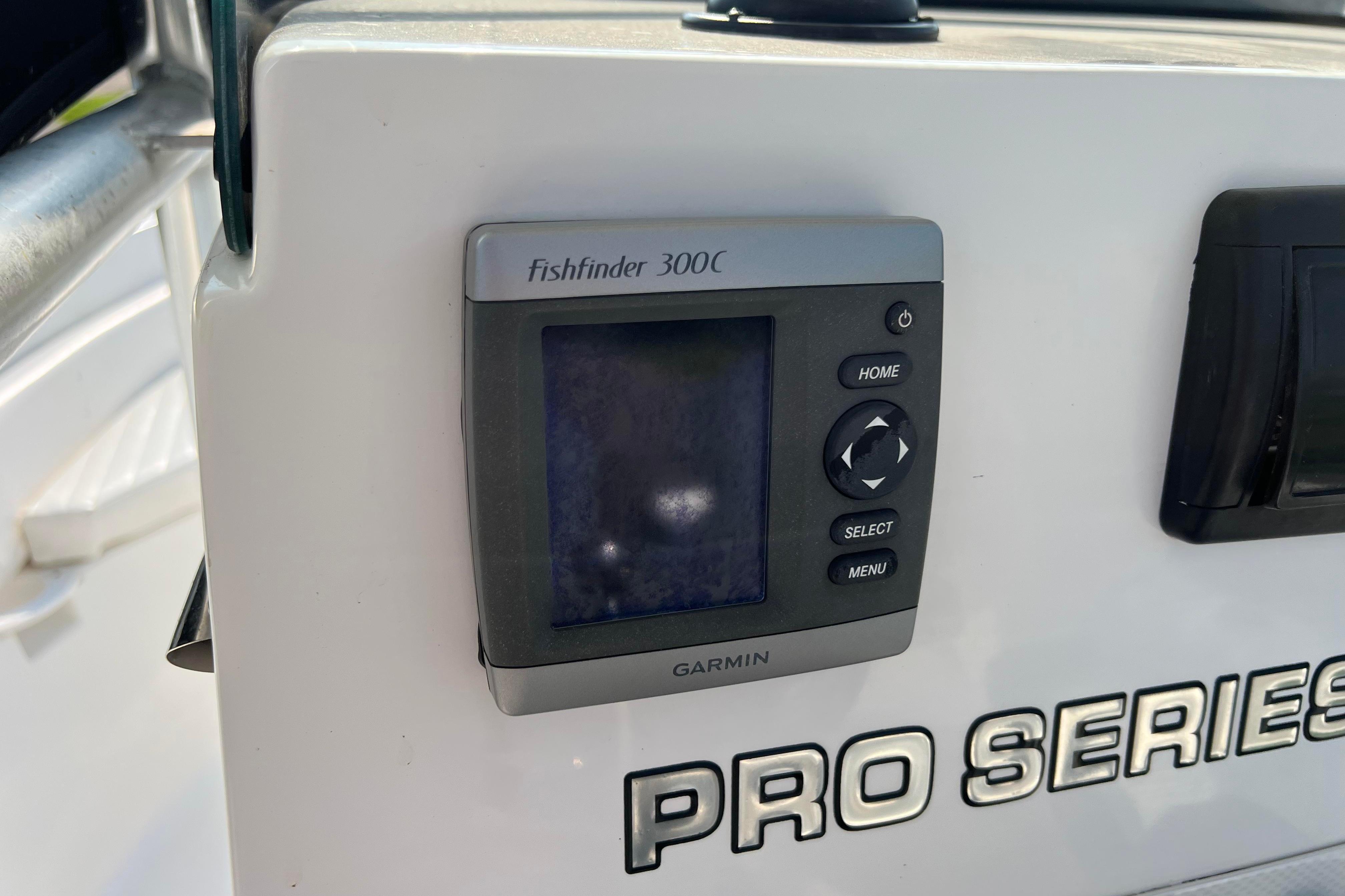 Garmin Fishfinder 300C on 2012 Sea Fox 206 Center Console boat dashboard.