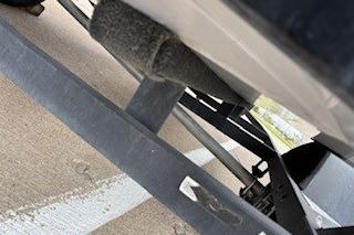 2018 Tracker Pro Team 175 TXW boat trailer close-up, showing undercarriage and support structure.