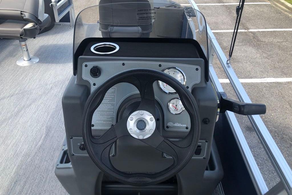 Steering console of 2026 Sun Tracker Bass Buggy 18 DLX pontoon boat.