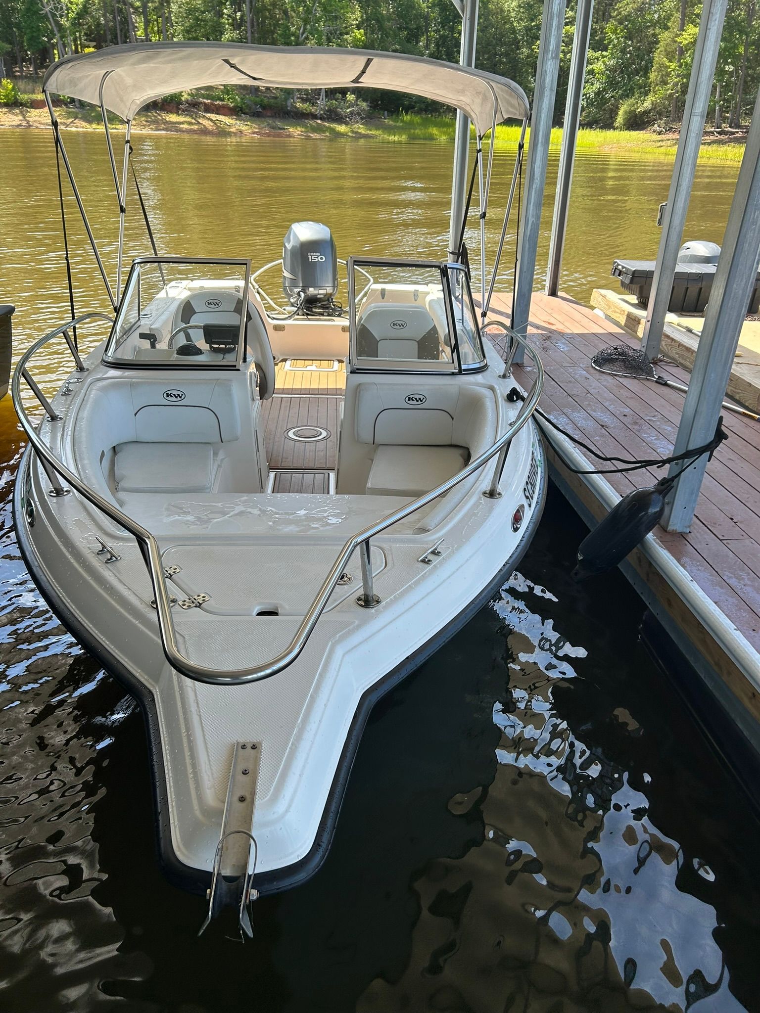 Key West 2020 Dual Console boat at dock, year 2012.