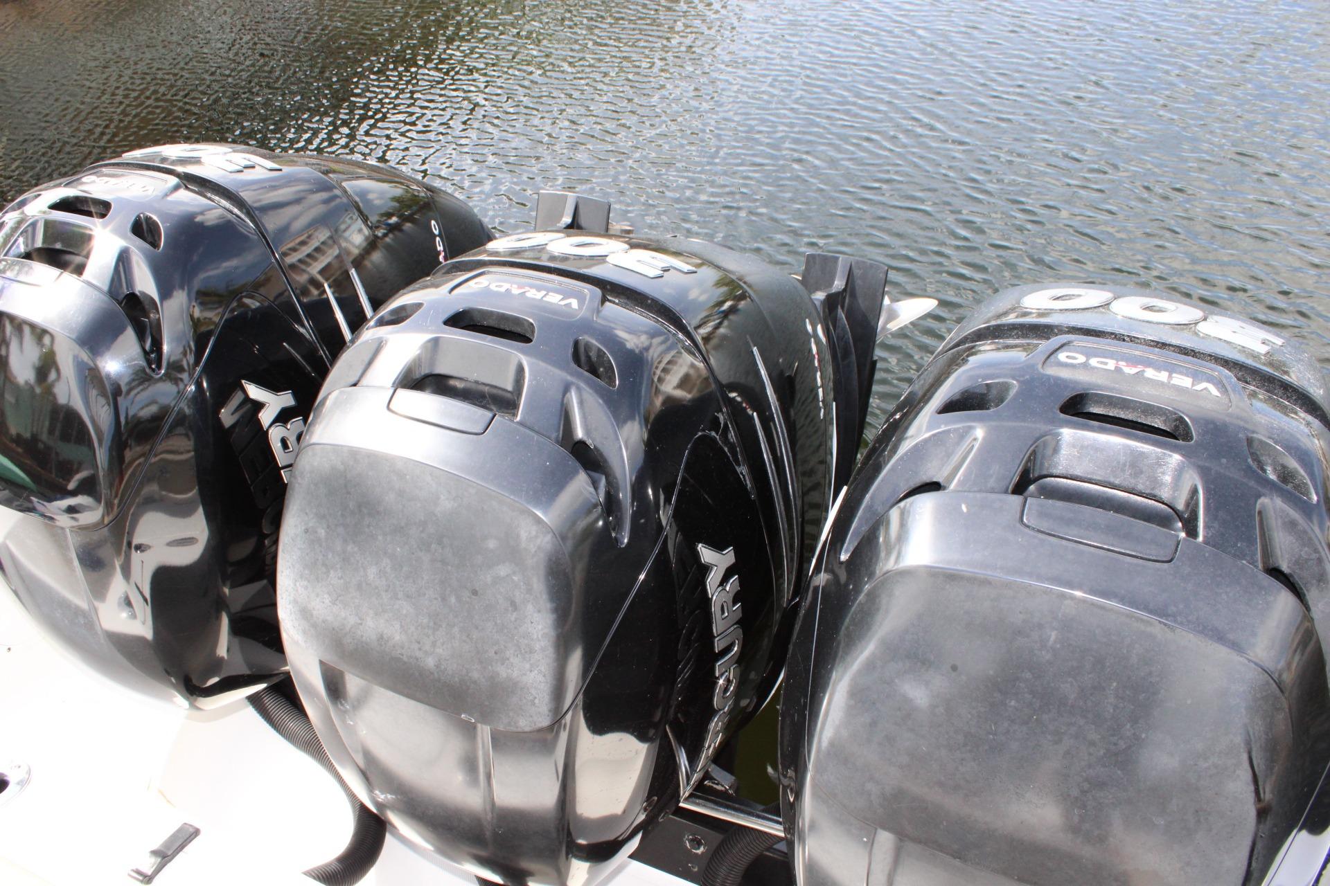 Triple Mercury outboard engines on a 2007 Fountain 34 Center Console boat.