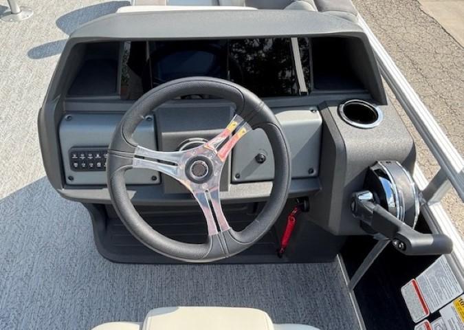 Steering console of 2026 Sun Tracker Fishin' Barge 20 DLX pontoon boat.