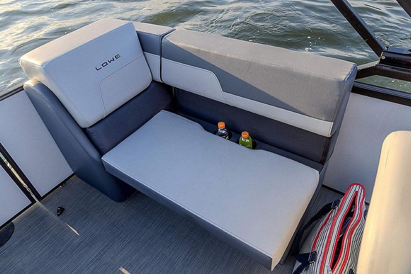 Manufacturer Provided Image: 2026 Lowe LS 210 WT boat interior with gray seating and cup holders on the water.