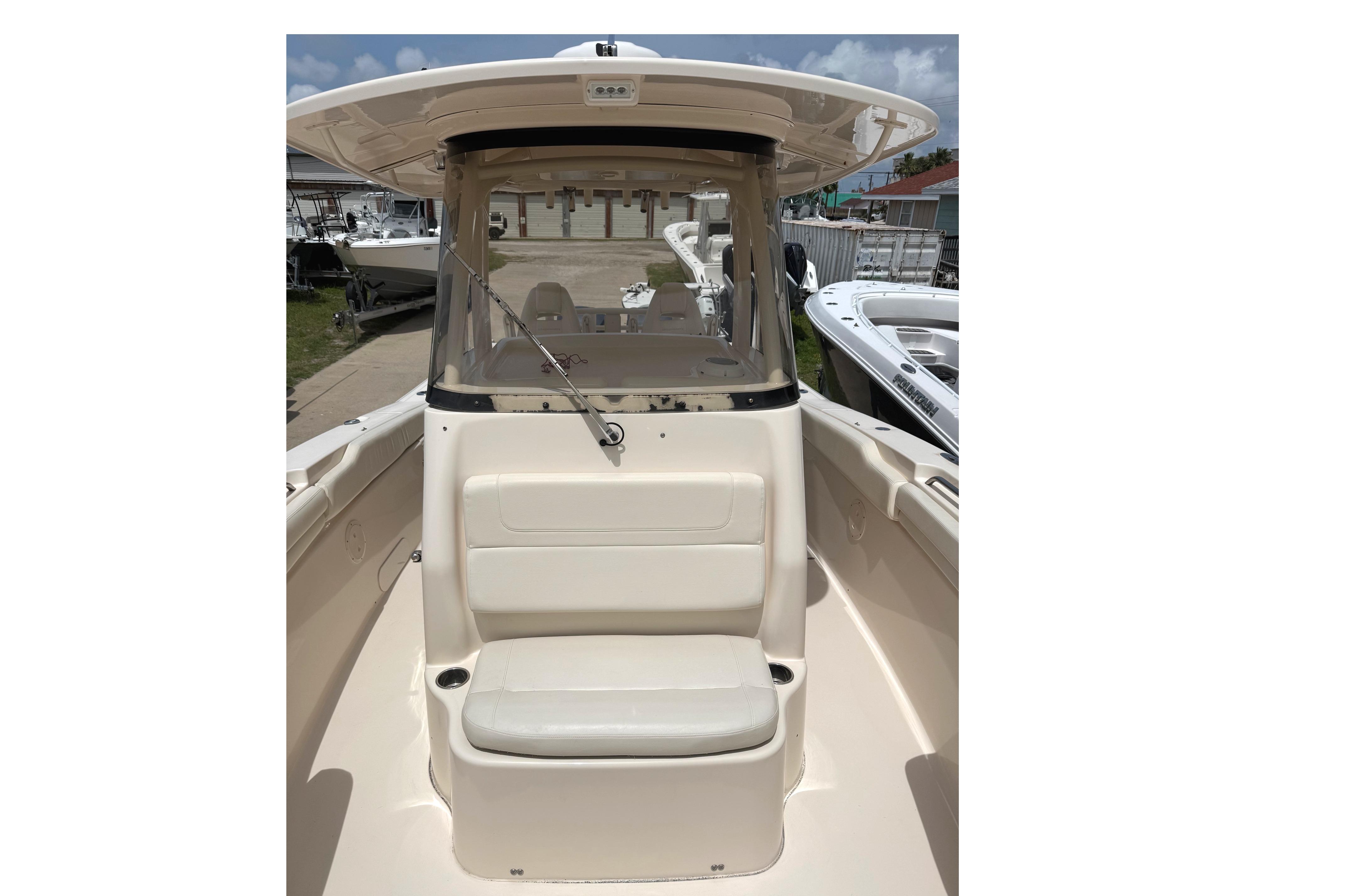 2018 Grady-White Canyon 306 boat interior with seating and console view.