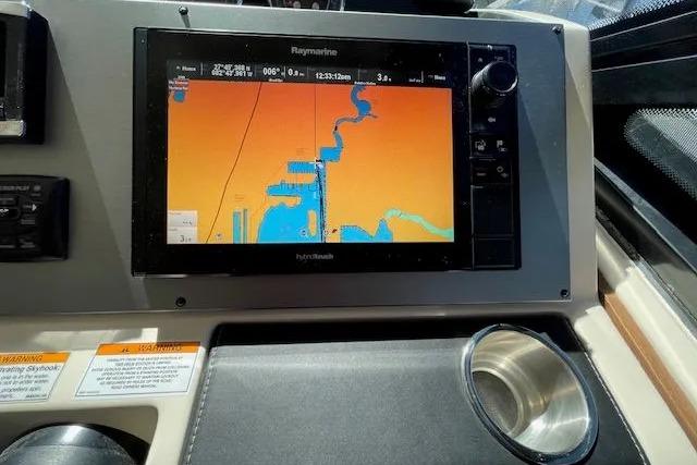 Raymarine navigation system on 2016 Sea Ray Sundancer 510 yacht dashboard.
