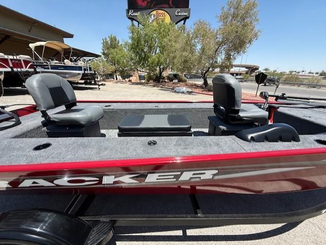2025 Tracker Panfish 17 boat with dual seats, parked outdoors under clear skies.