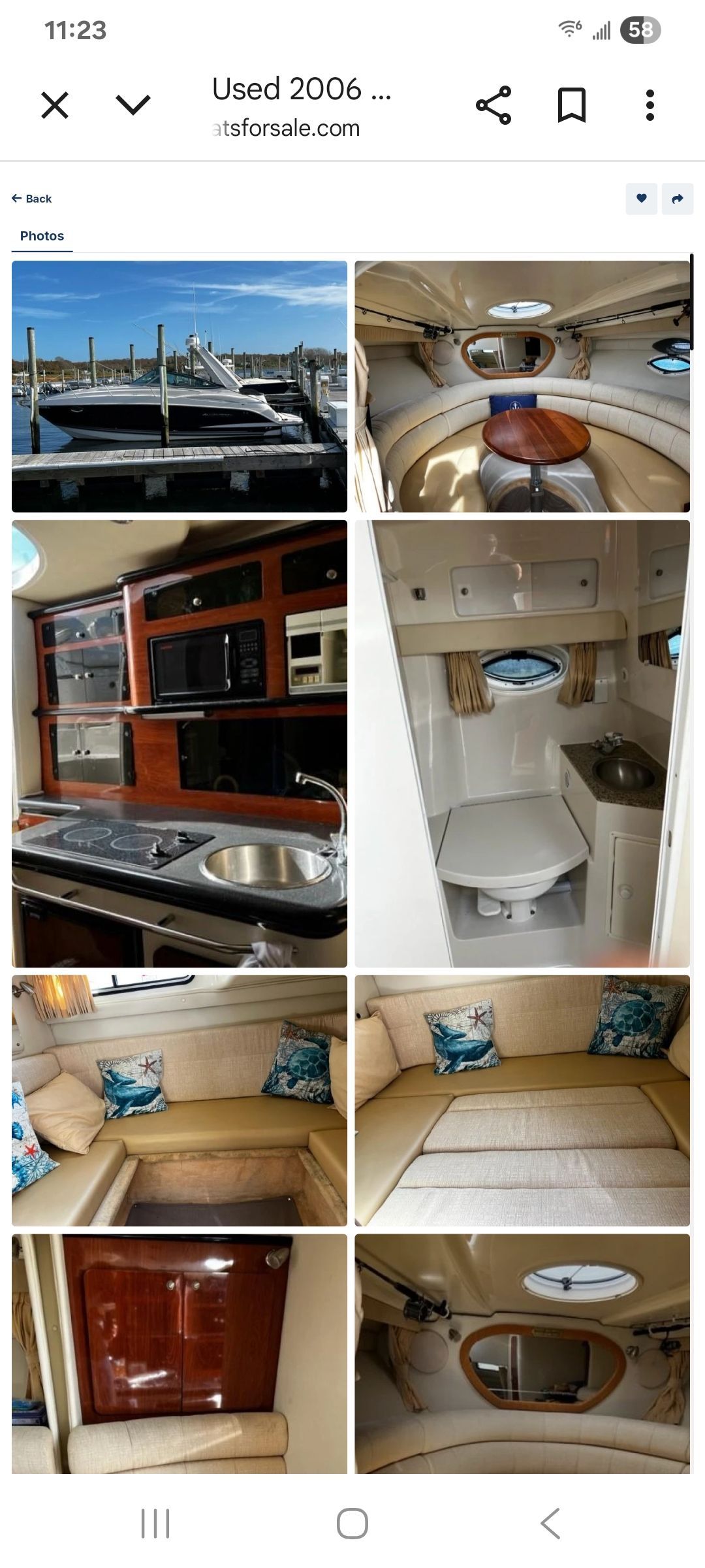 Interior of a 2006 Monterey 290 Cruiser with kitchen, seating area, and sleeping quarters.