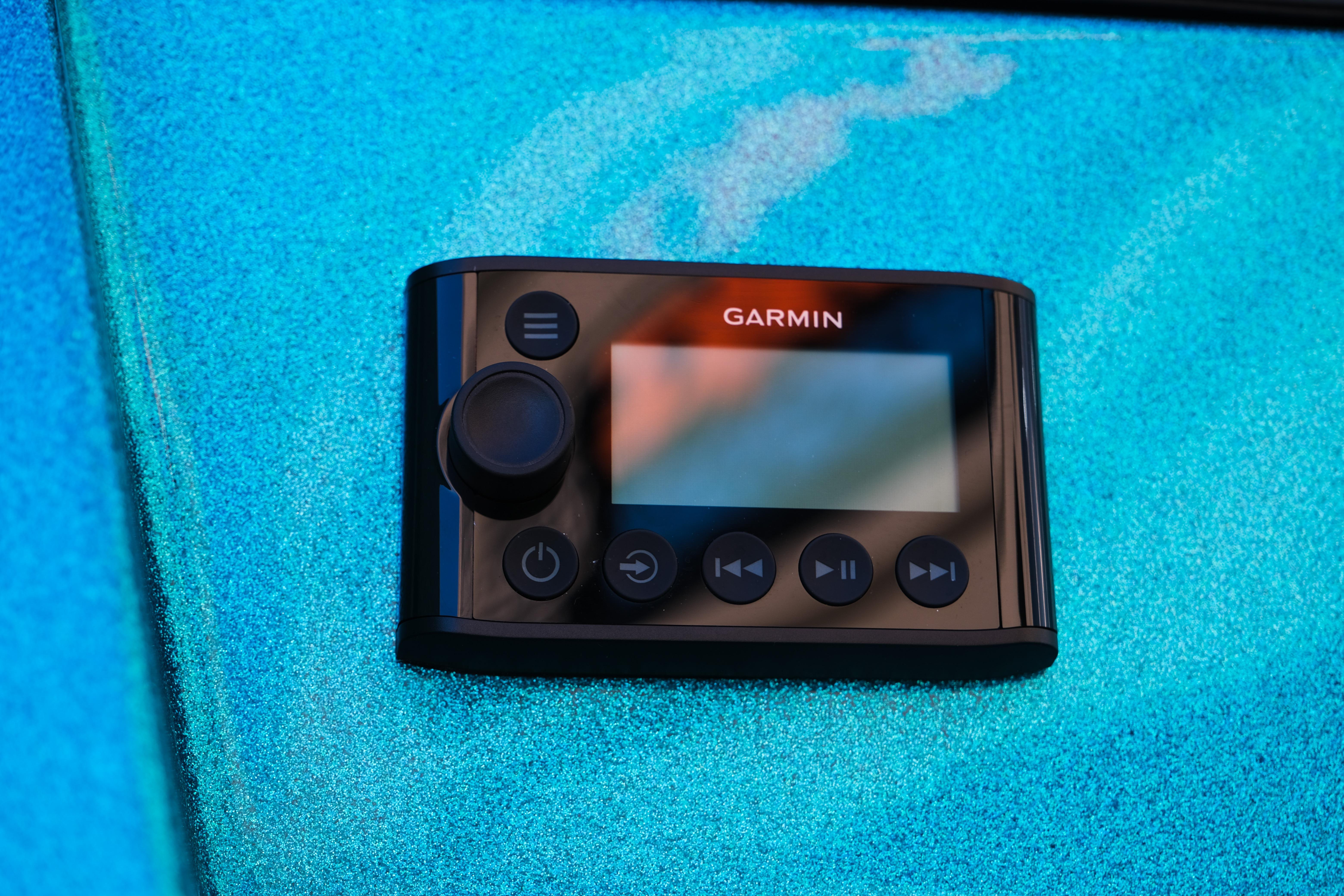 Garmin control panel on 2026 Moomba Max boat, set against a vibrant blue background.
