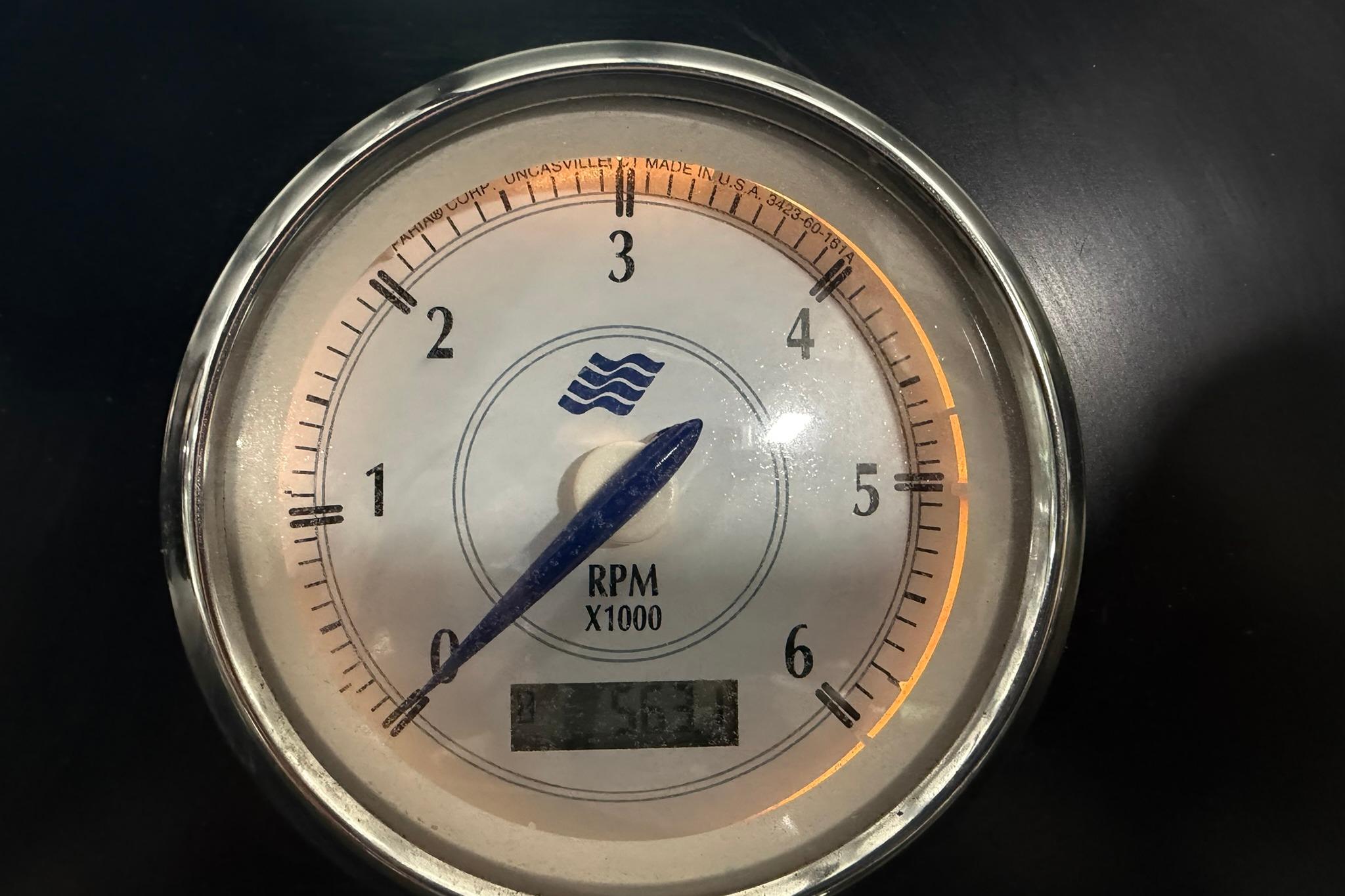 Tachometer of 2008 Four Winns V248 boat displaying RPM in thousands.