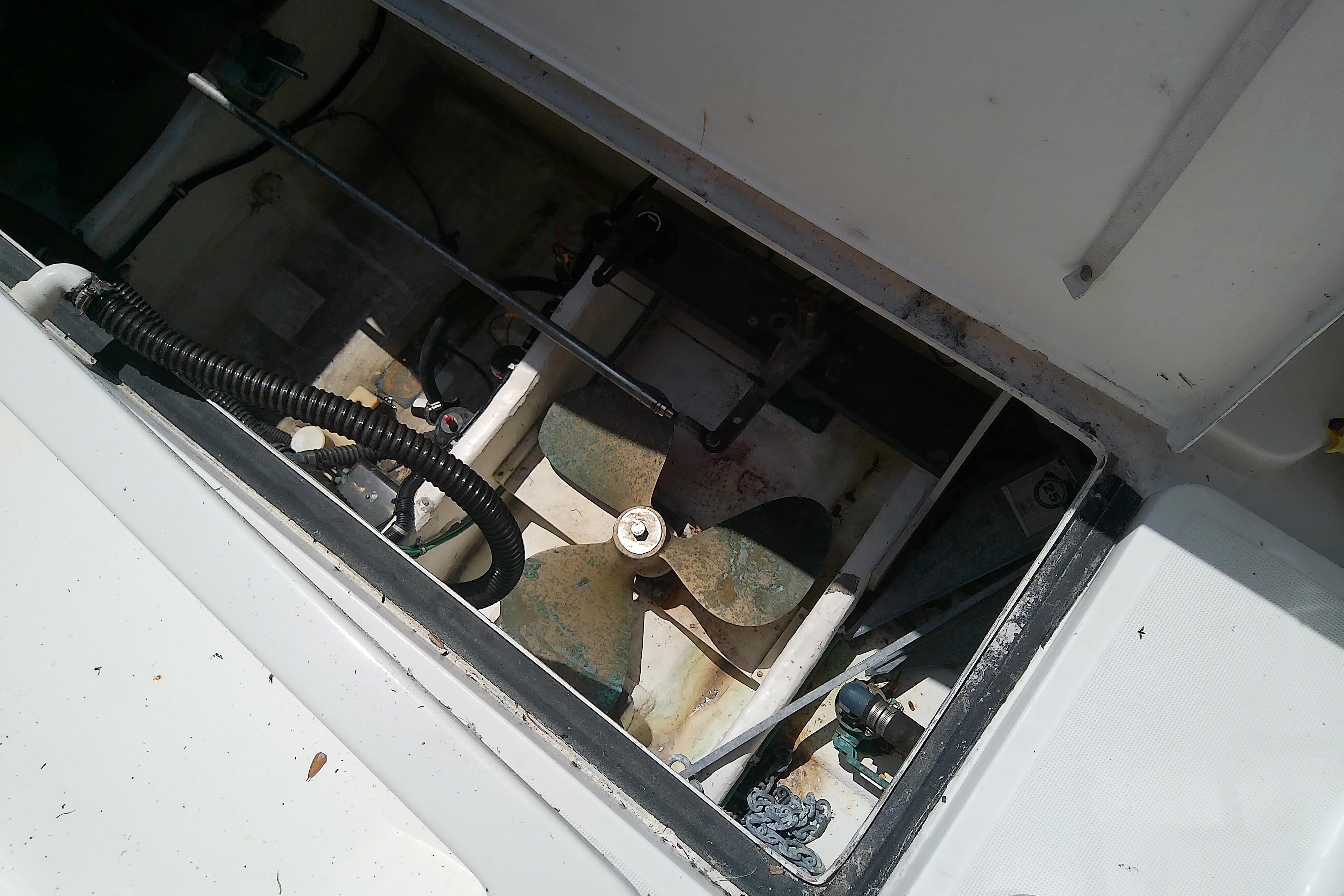 Engine compartment of a 2000 Tiara Yachts 4100 Open, showing mechanical components and wiring.