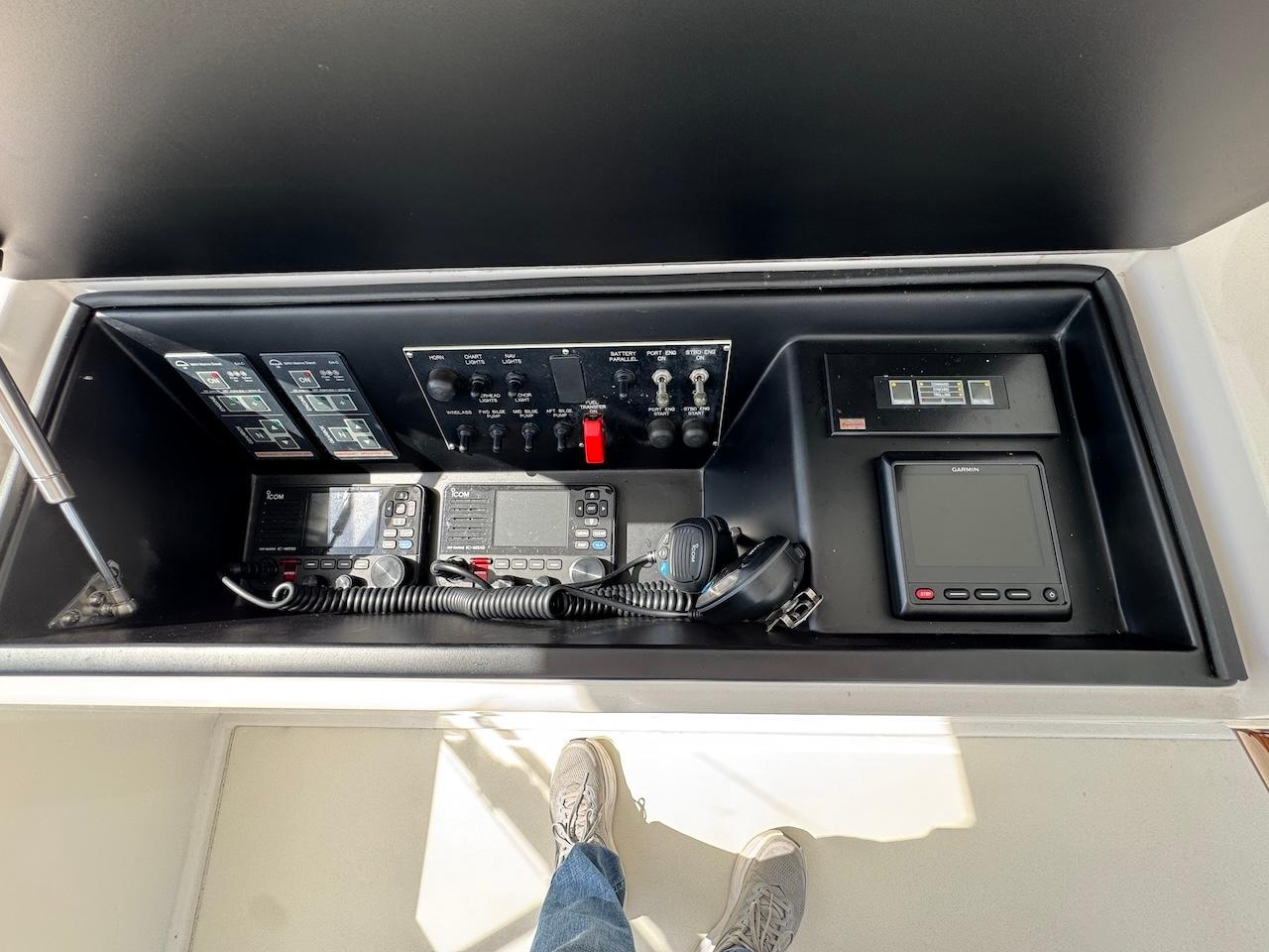 Control panel of a 2007 Viking 52 Convertibles yacht, featuring navigation and communication equipment.