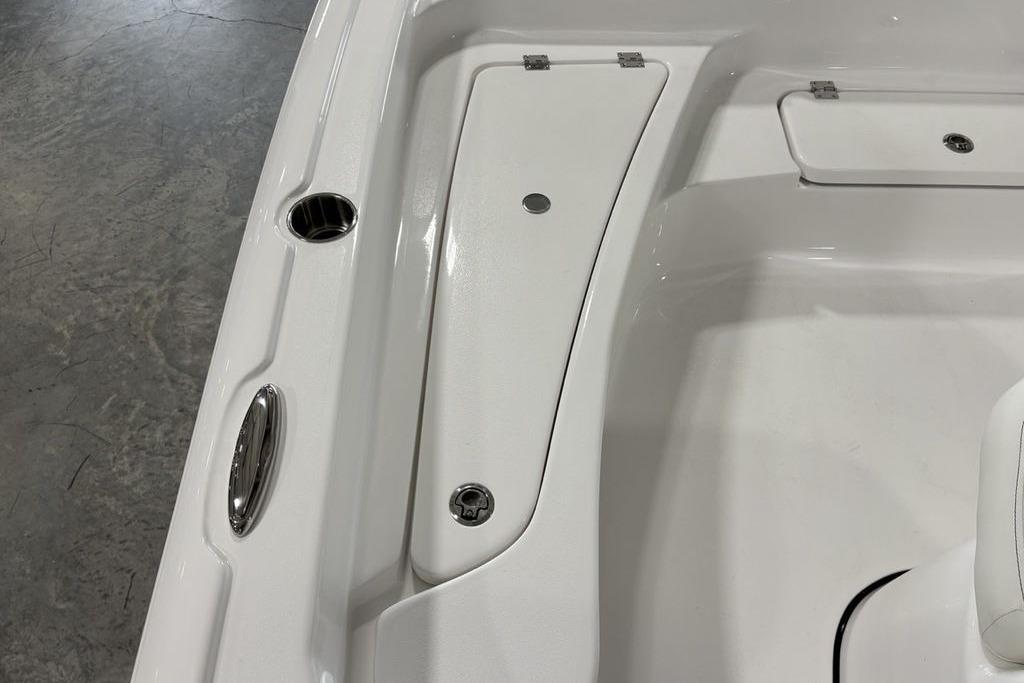 2026 Tidewater 2210 Carolina Bay boat interior with storage compartments and sleek design.