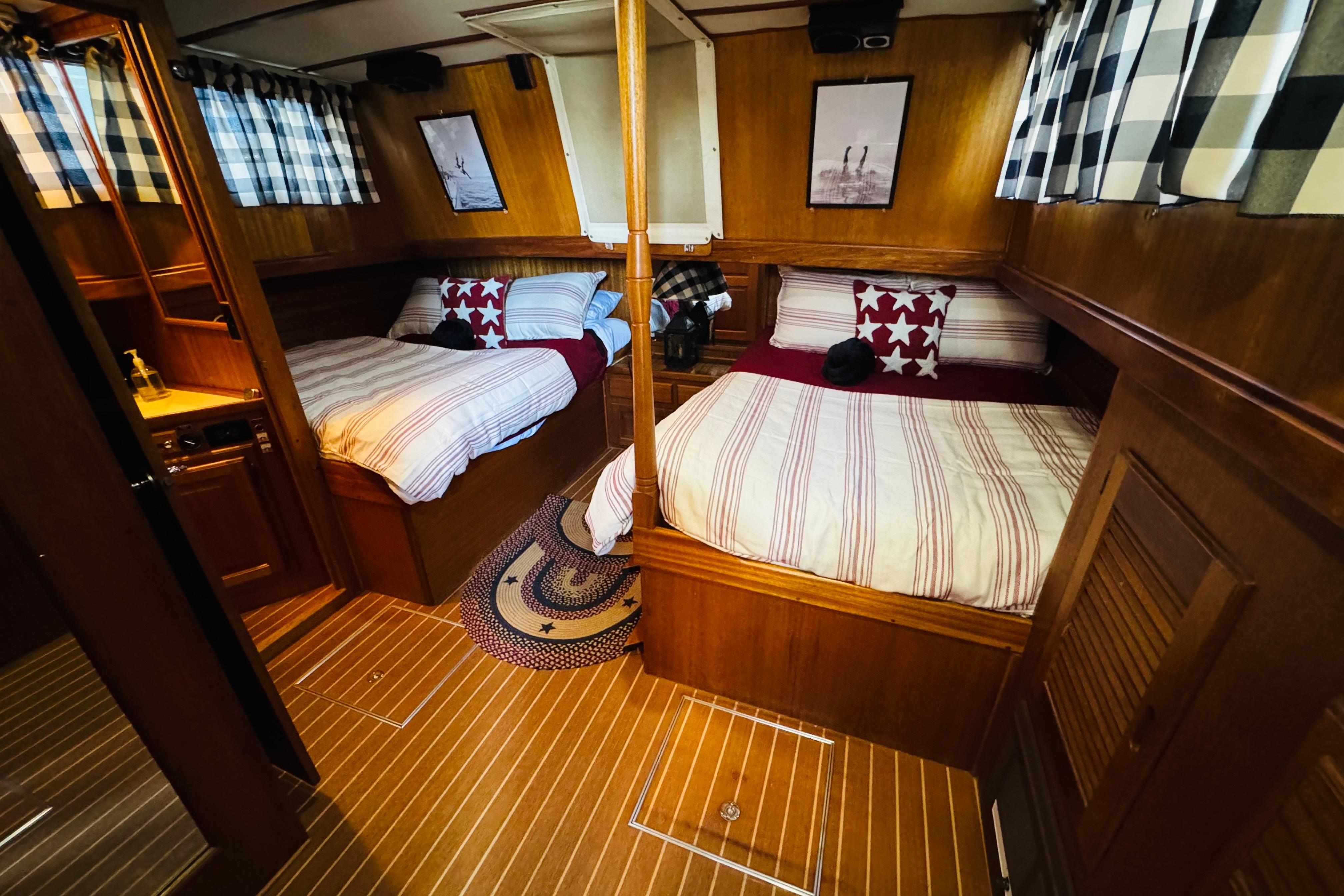 1978 Californian 42 LRC yacht interior with twin beds, wood paneling, and nautical decor.