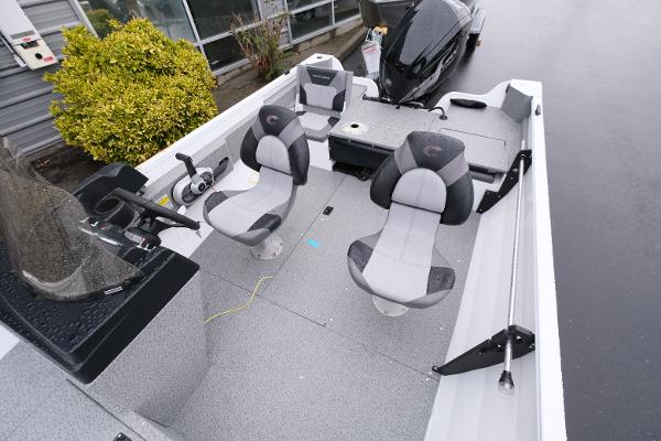 2024 Crestliner 1600 Vision boat interior with seating and steering console.