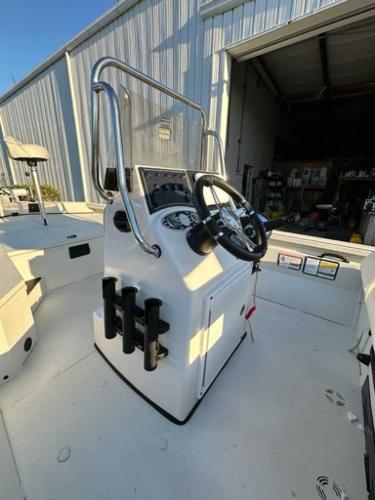 2024 Ranger RB190 boat console with steering wheel and rod holders.