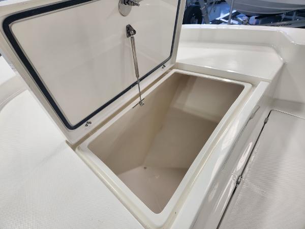 2025 Pathfinder 2400 Open boat storage compartment with open lid.