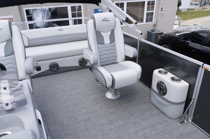 Luxurious interior of 2026 SunCatcher Elite 326 SL pontoon boat with plush seating.