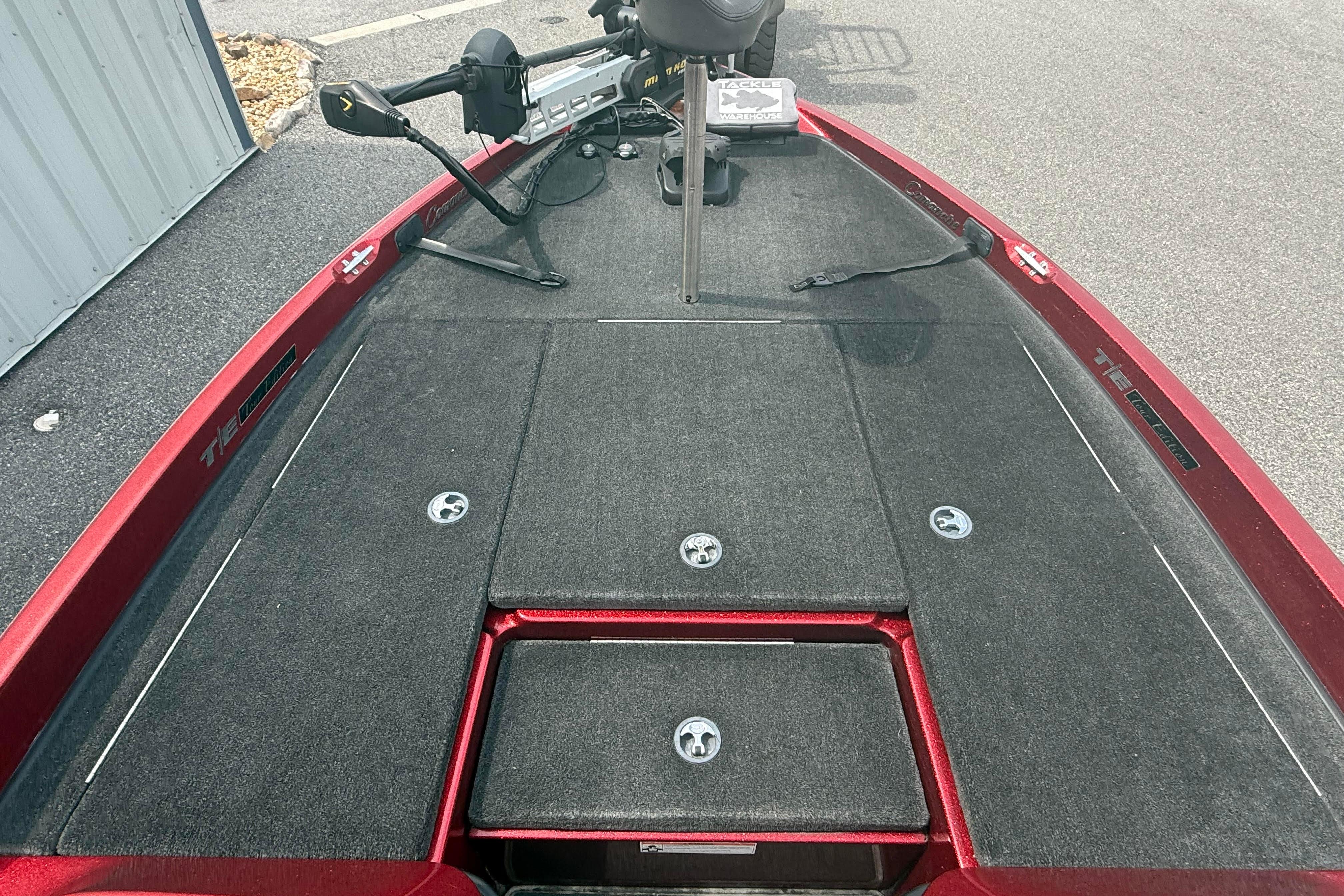 2007 Ranger 519 VX boat deck with storage compartments and trolling motor.