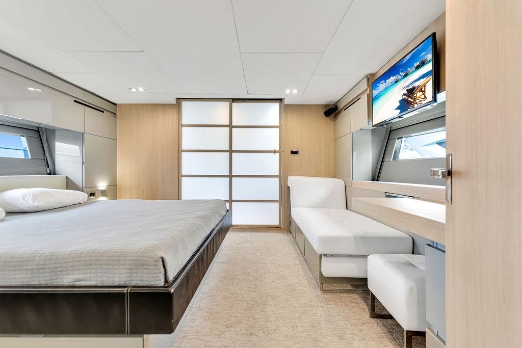 Luxurious interior of 2012 Fairline Targa 58 yacht with modern bedroom design.