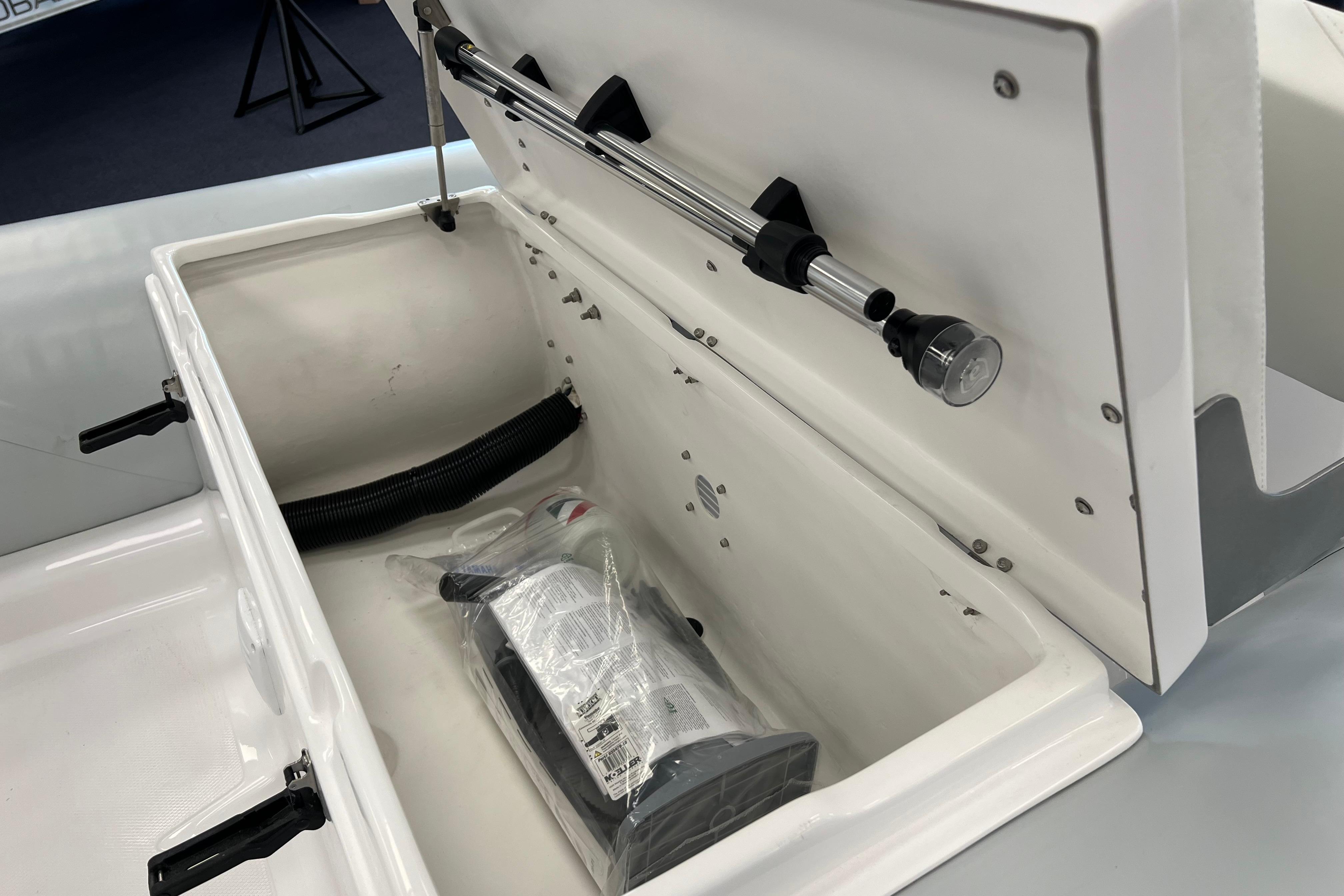 2023 AB Inflatables Mares 12 VSX storage compartment with equipment inside.