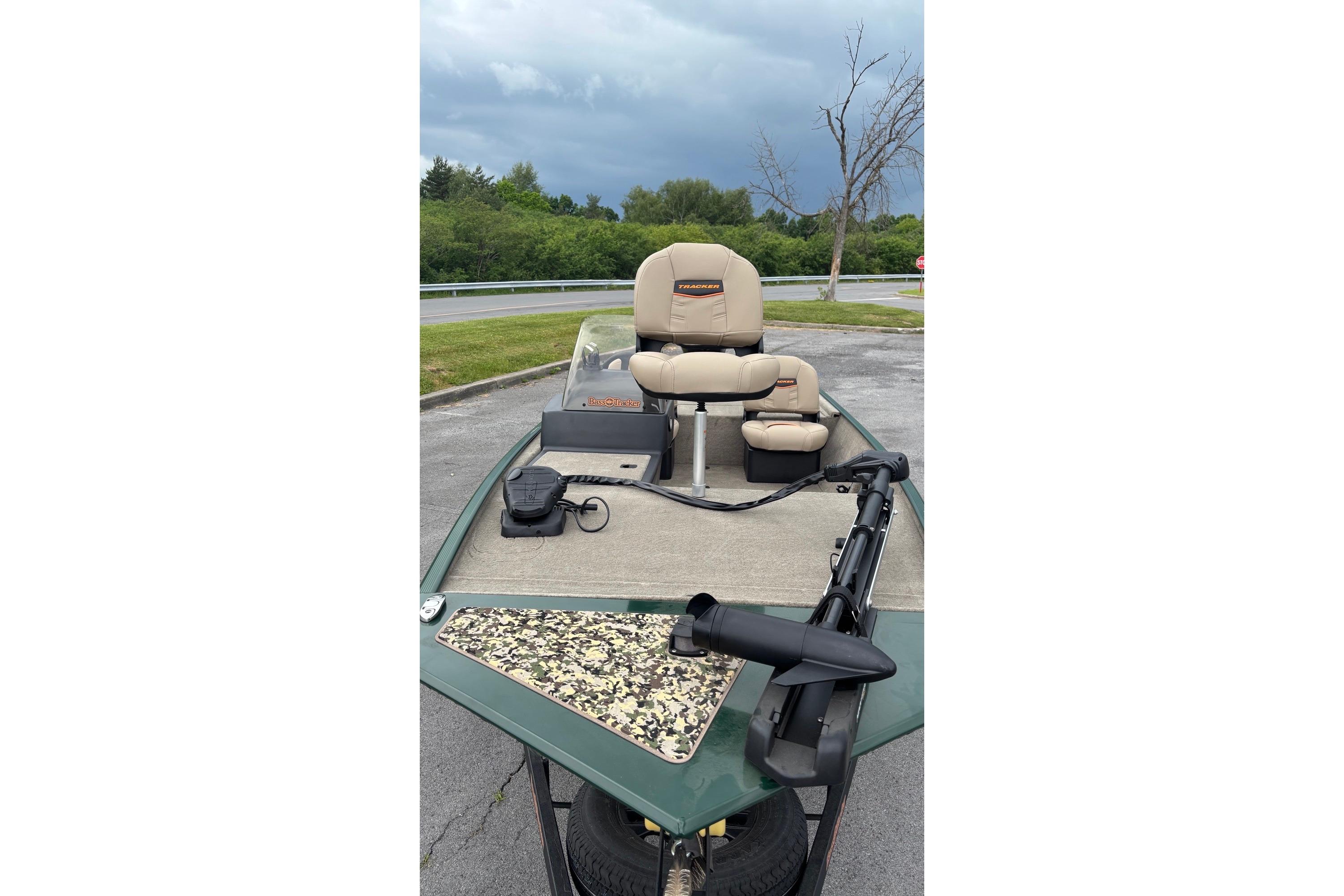 2026 Tracker Bass Tracker Classic Limited boat with beige seats and trolling motor.