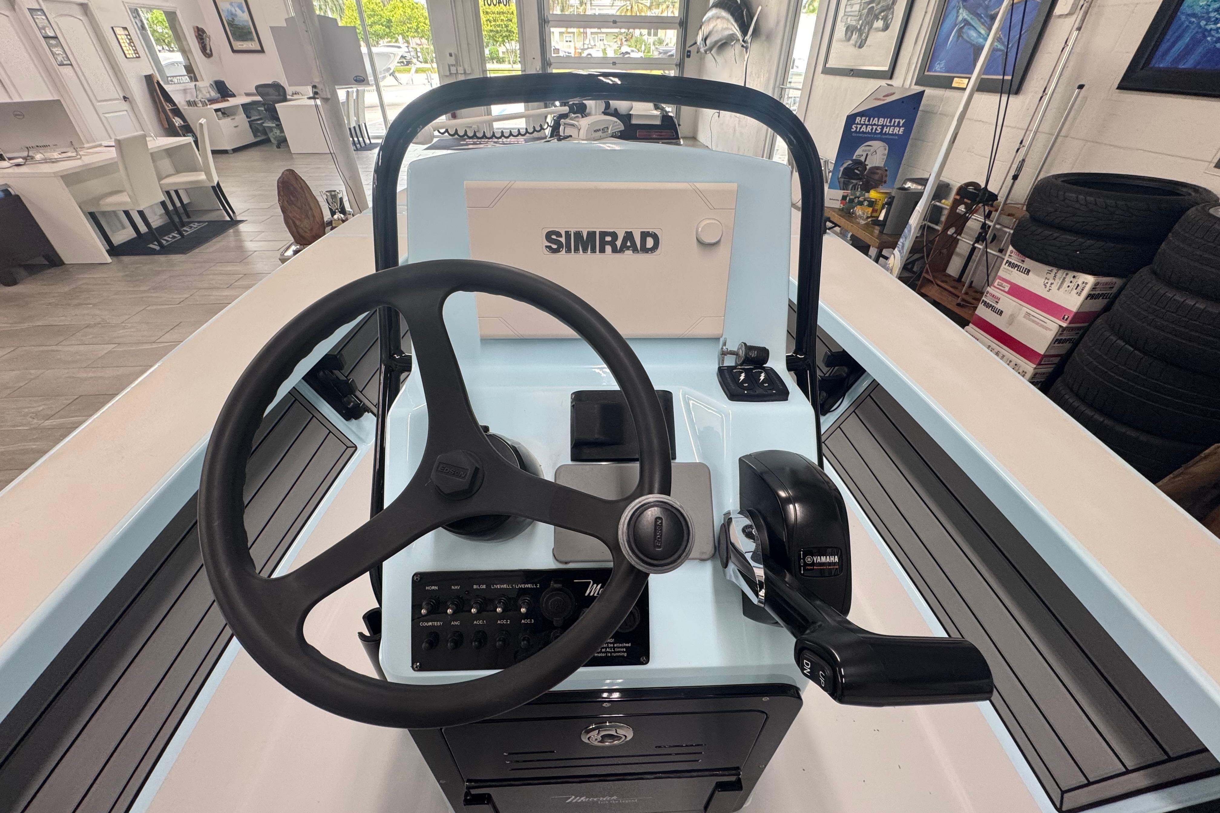 2020 Maverick Mirage 18 HPX-V boat console with Simrad navigation system and Yamaha controls.