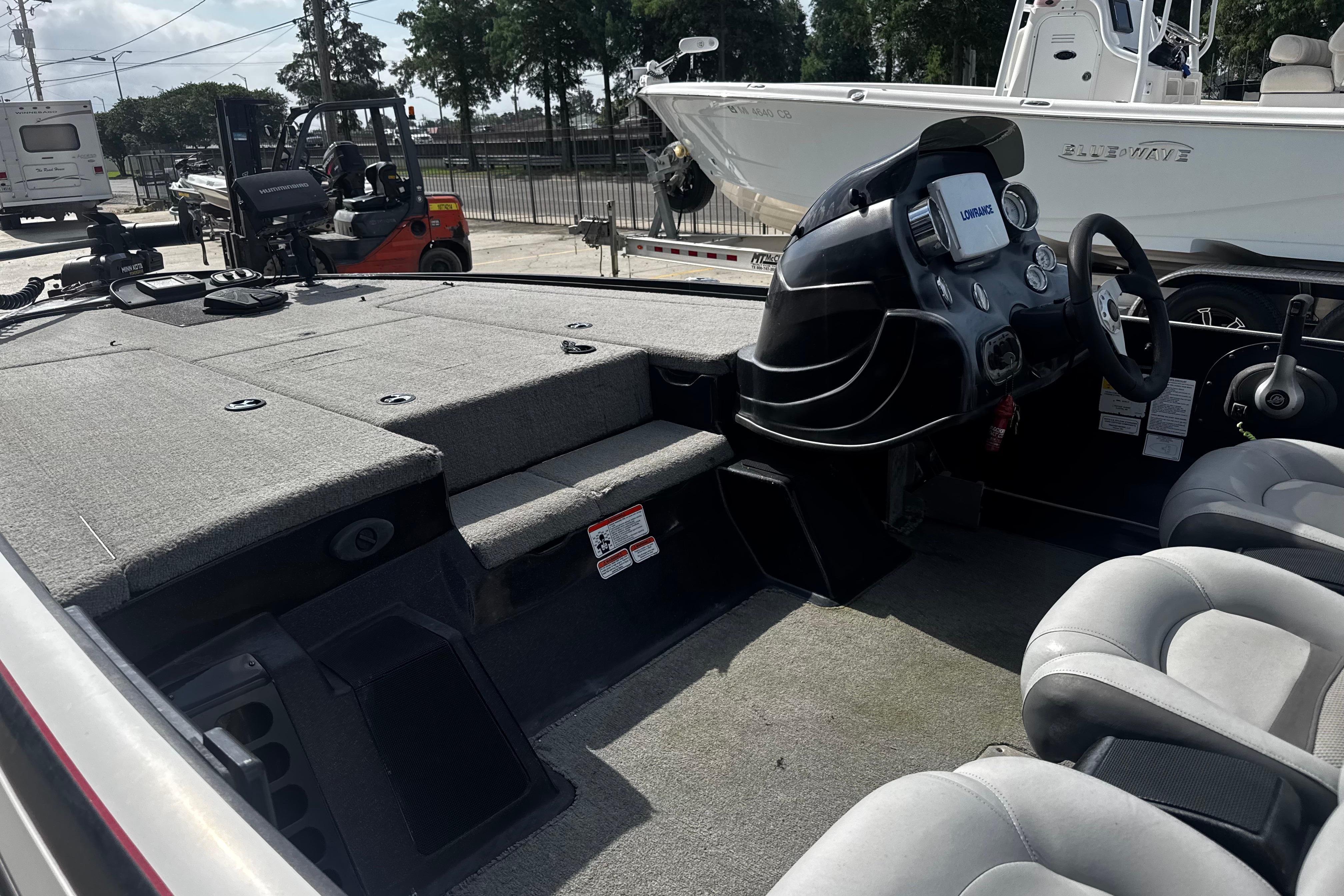 Interior of a 2012 Nitro Z-7 boat with steering console and seating.