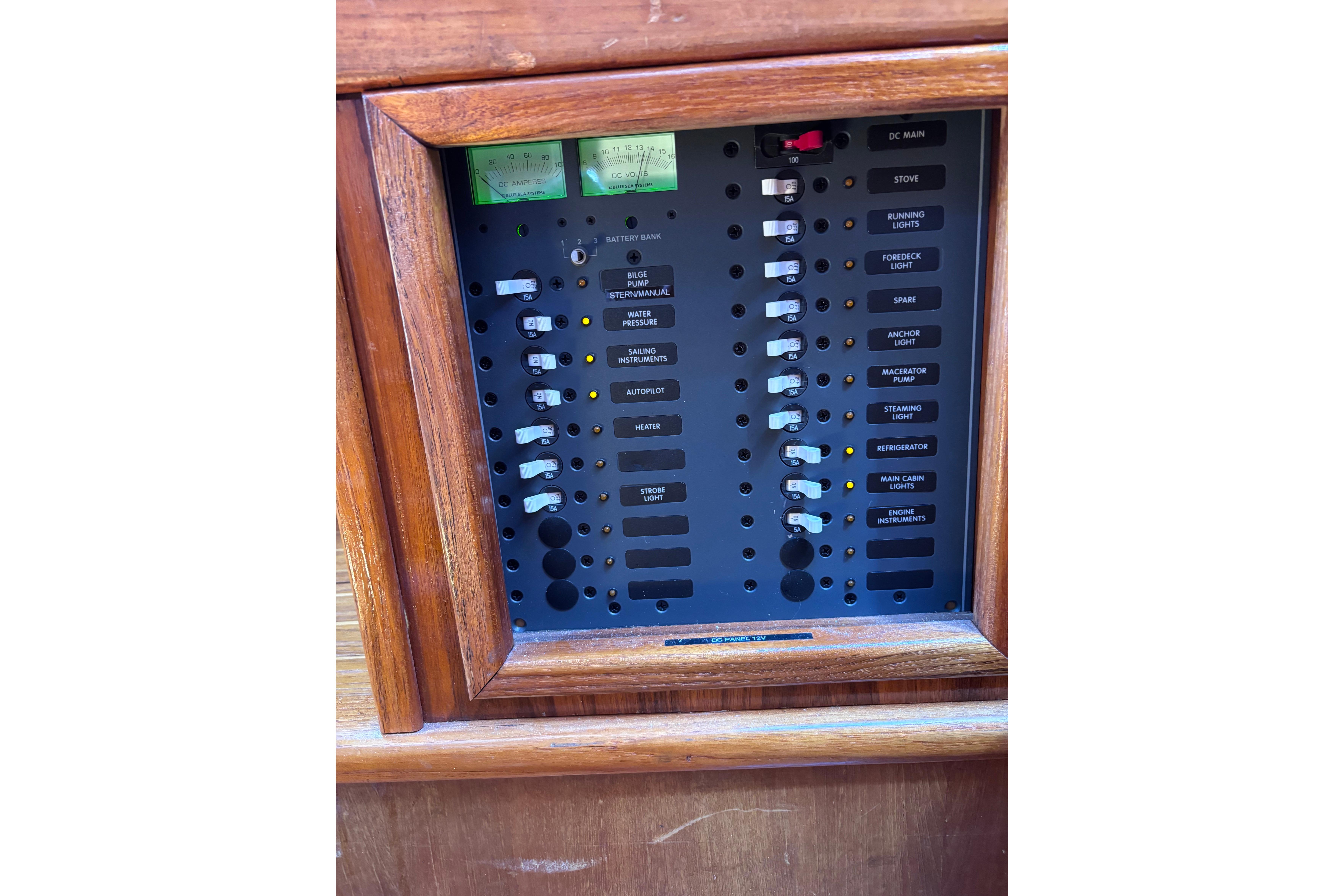 Electrical control panel on a 1978 Swift 33 boat, featuring labeled switches and meters.
