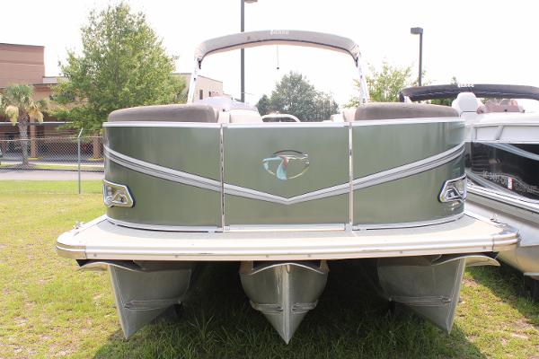 2021 Tahoe LTZ Cruise pontoon boat, rear view, parked on grass.