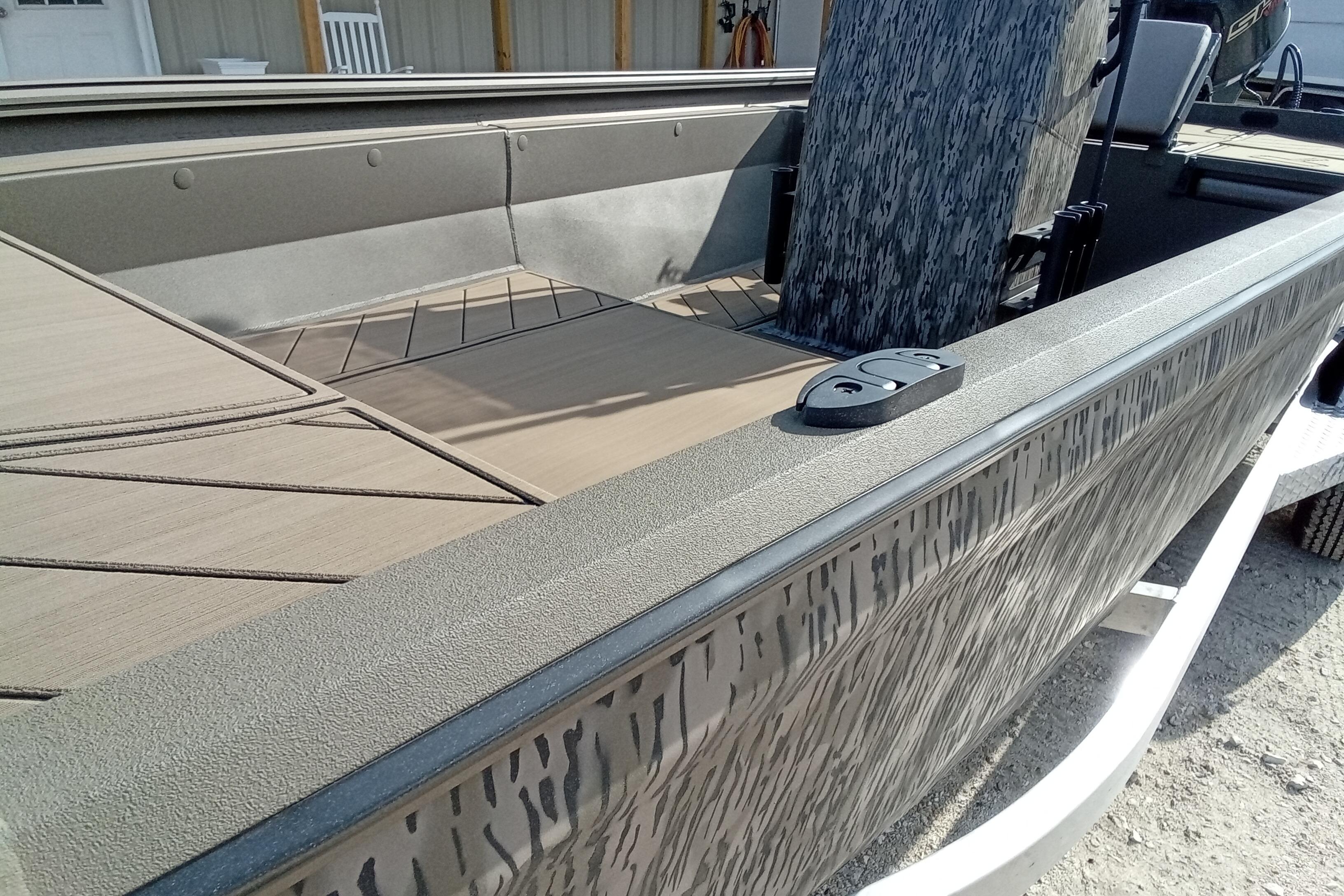 2026 Thor 1900 Low Country Elite boat interior with textured design and seating.