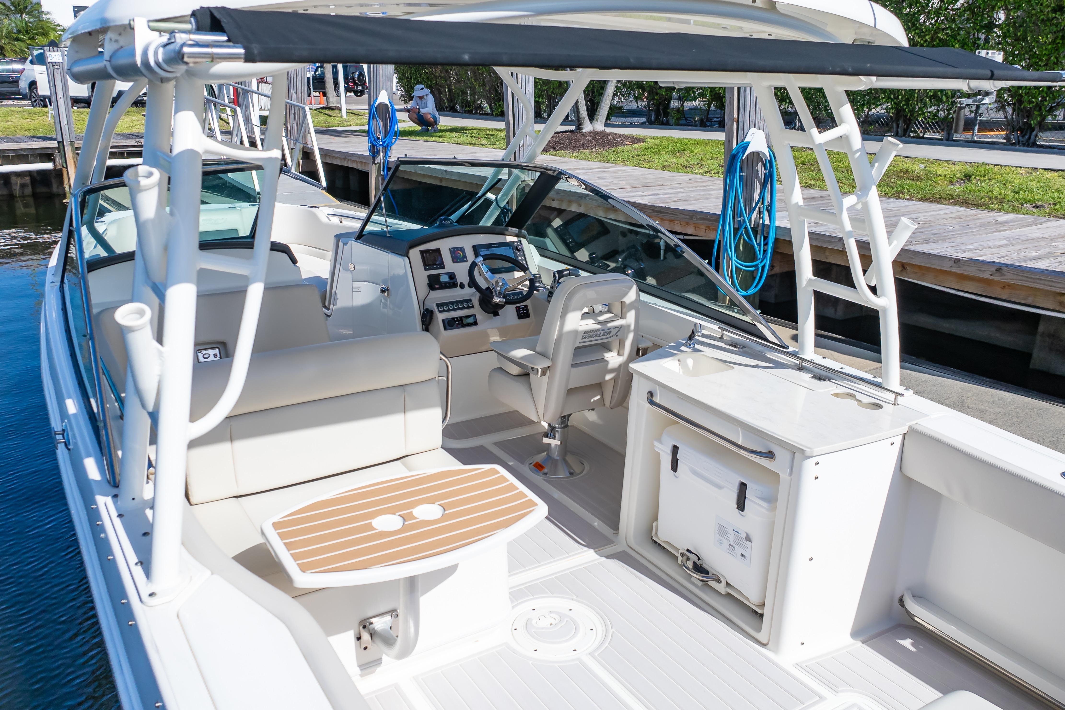 2019 Boston Whaler 270 Vantage boat interior with helm, seating, and storage.