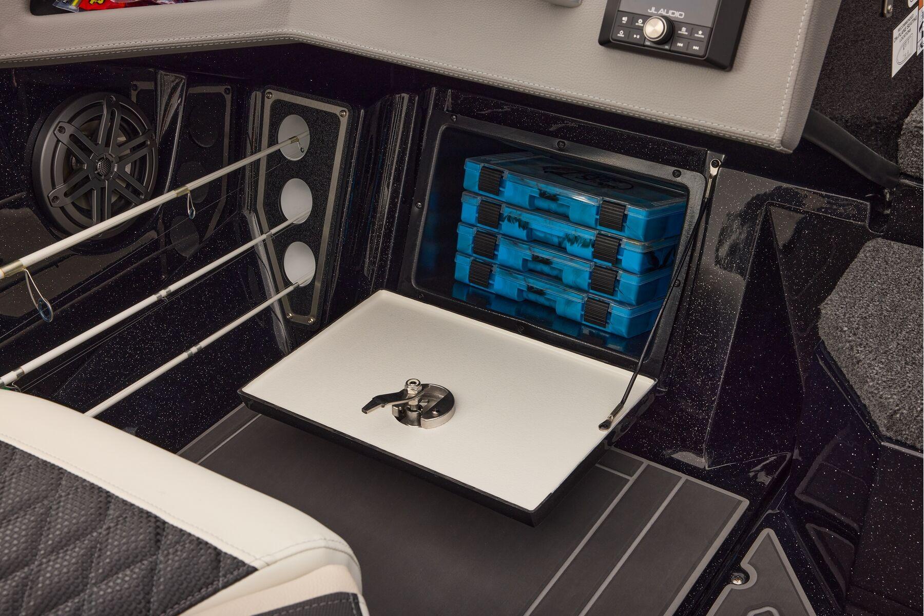 Manufacturer Provided Image: Interior of 2026 Ranger 620xFS Pro boat with storage compartments and fishing rod holders.