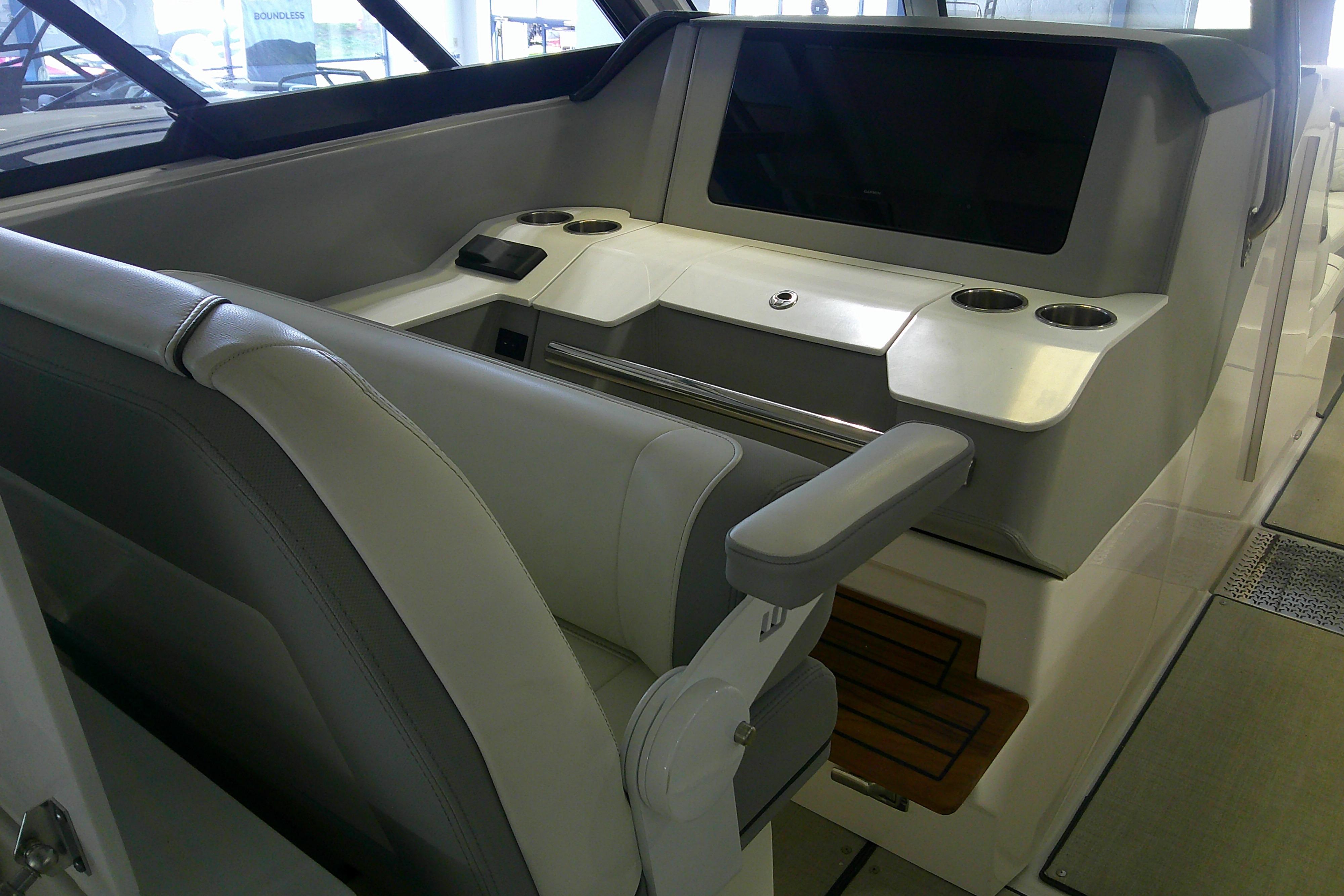 2023 Regal LX36 boat interior with modern seating and control panel.