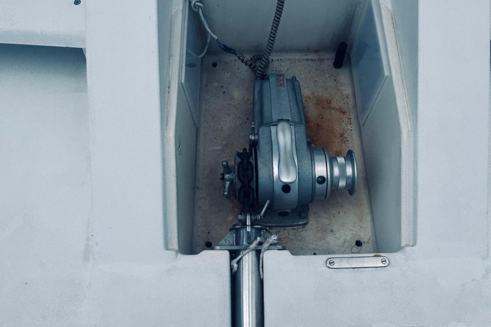Anchor winch on 2001 Robertson & Caine Leopard boat deck.