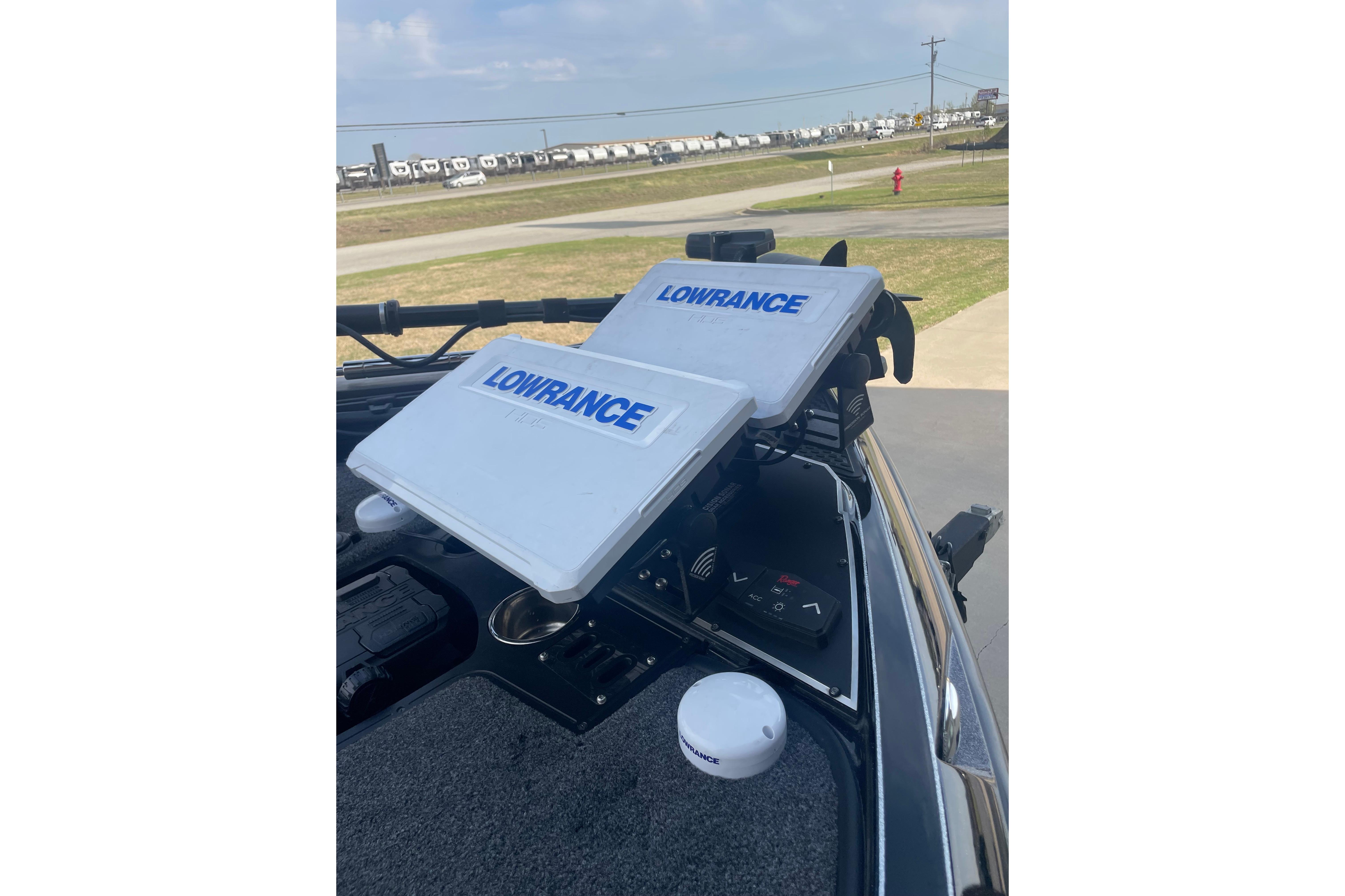2023 Ranger Z521R boat with dual Lowrance fish finders on the dashboard.