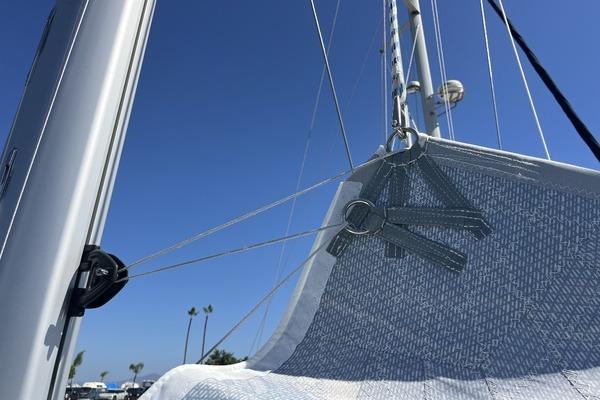 Sailboat rigging on a 2025 Hanse 360 under clear blue sky.