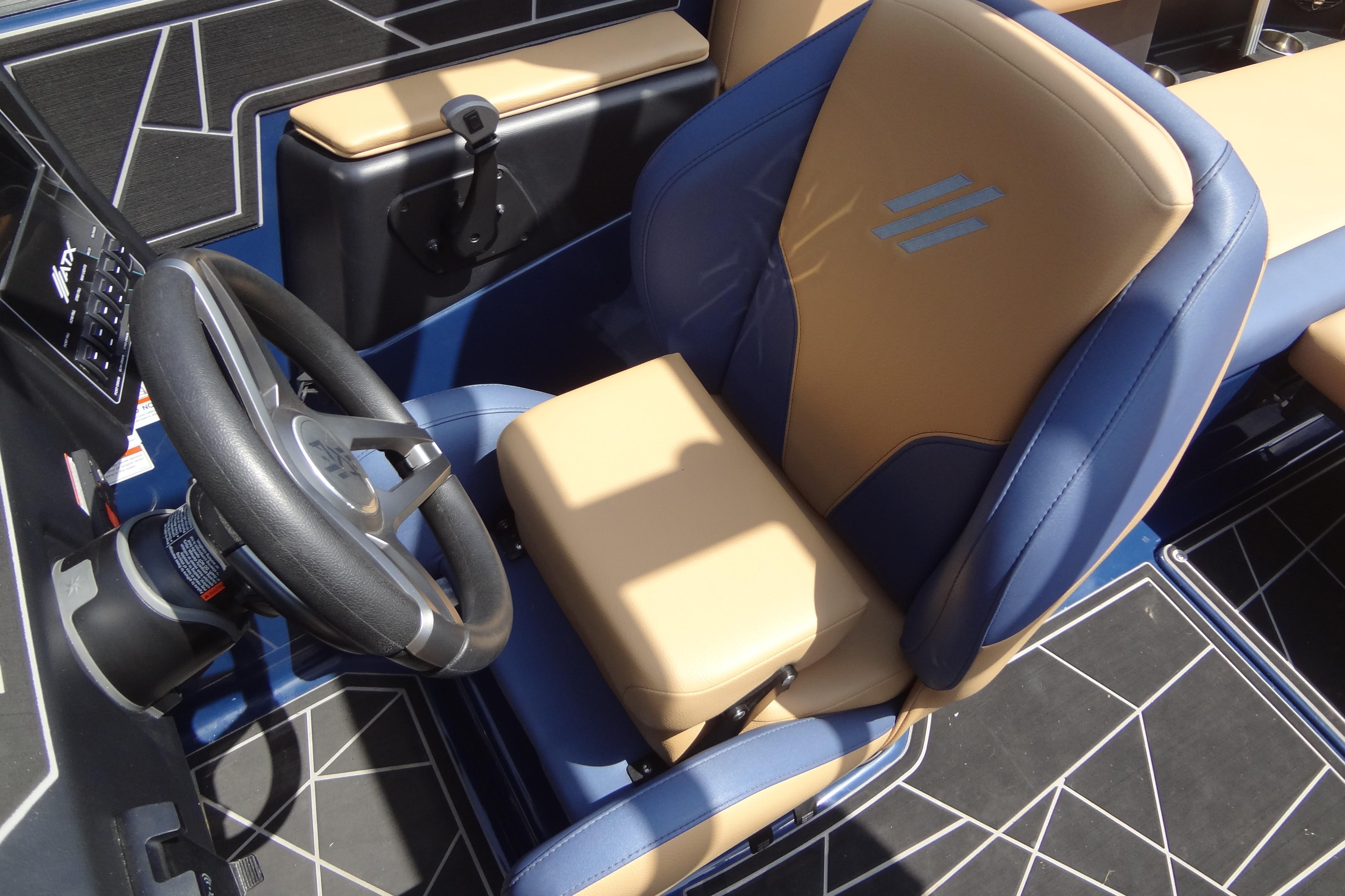 2022 ATX Surf Boats 24 Type-S interior with tan and blue captain's seat.