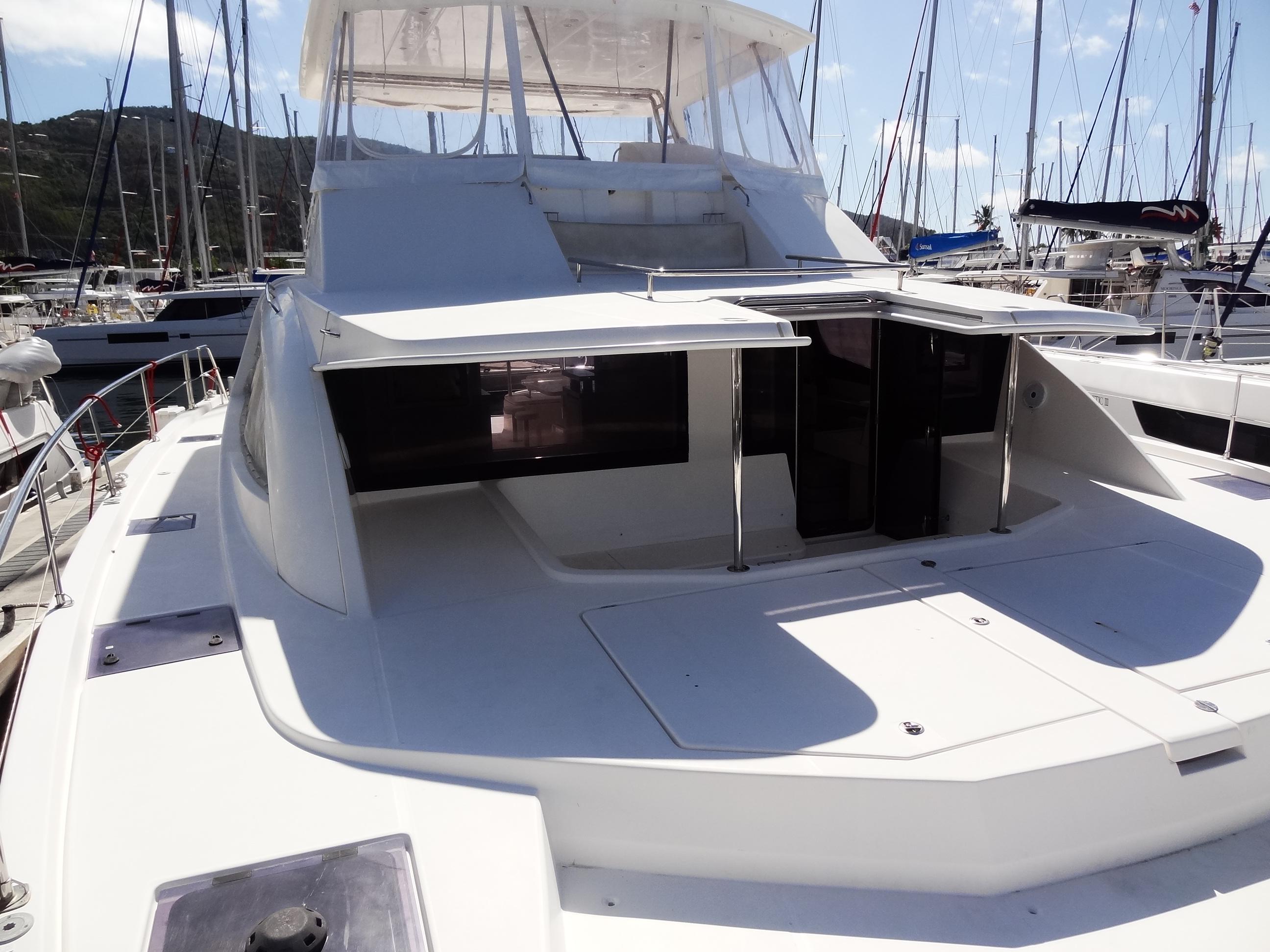 2017 Leopard 51 Powercat yacht docked at marina.