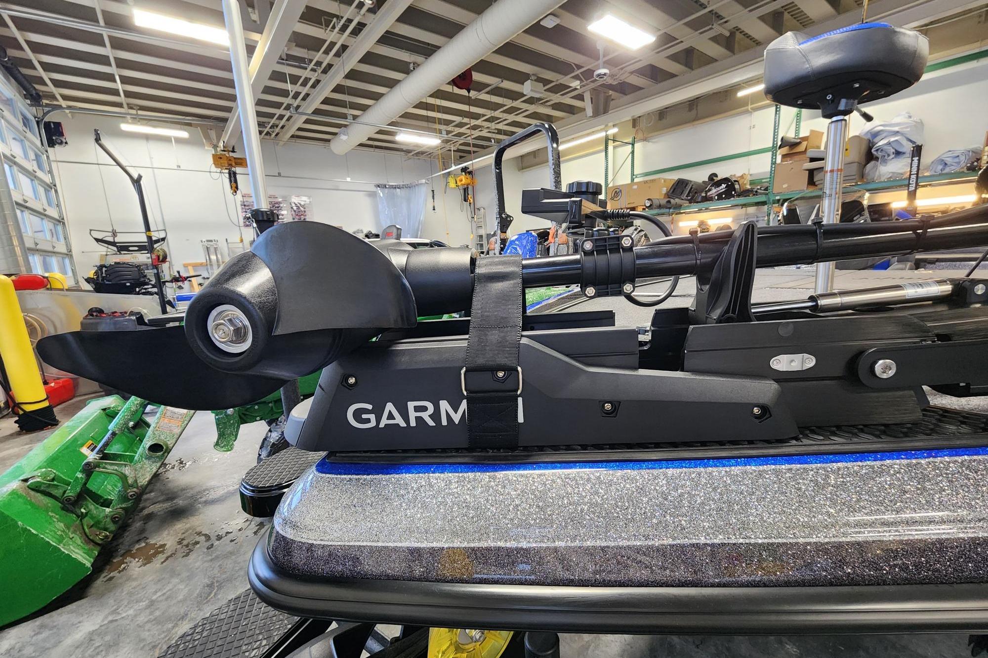 2025 Ranger Z521R boat with Garmin trolling motor in a workshop setting.