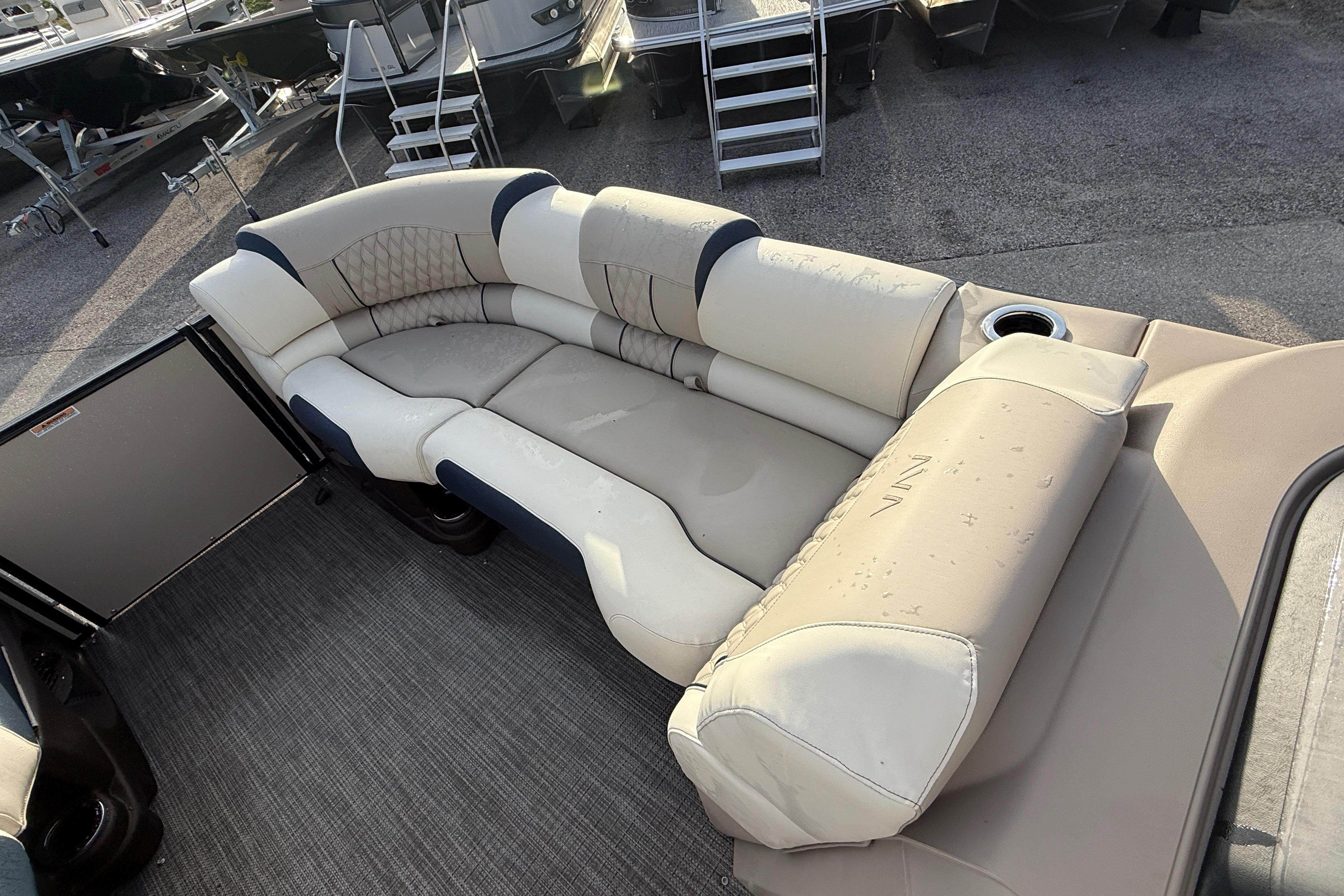 Luxurious seating on 2026 Avalon 2385 Catalina Quad Lounger, Tri Toon High Performance boat.