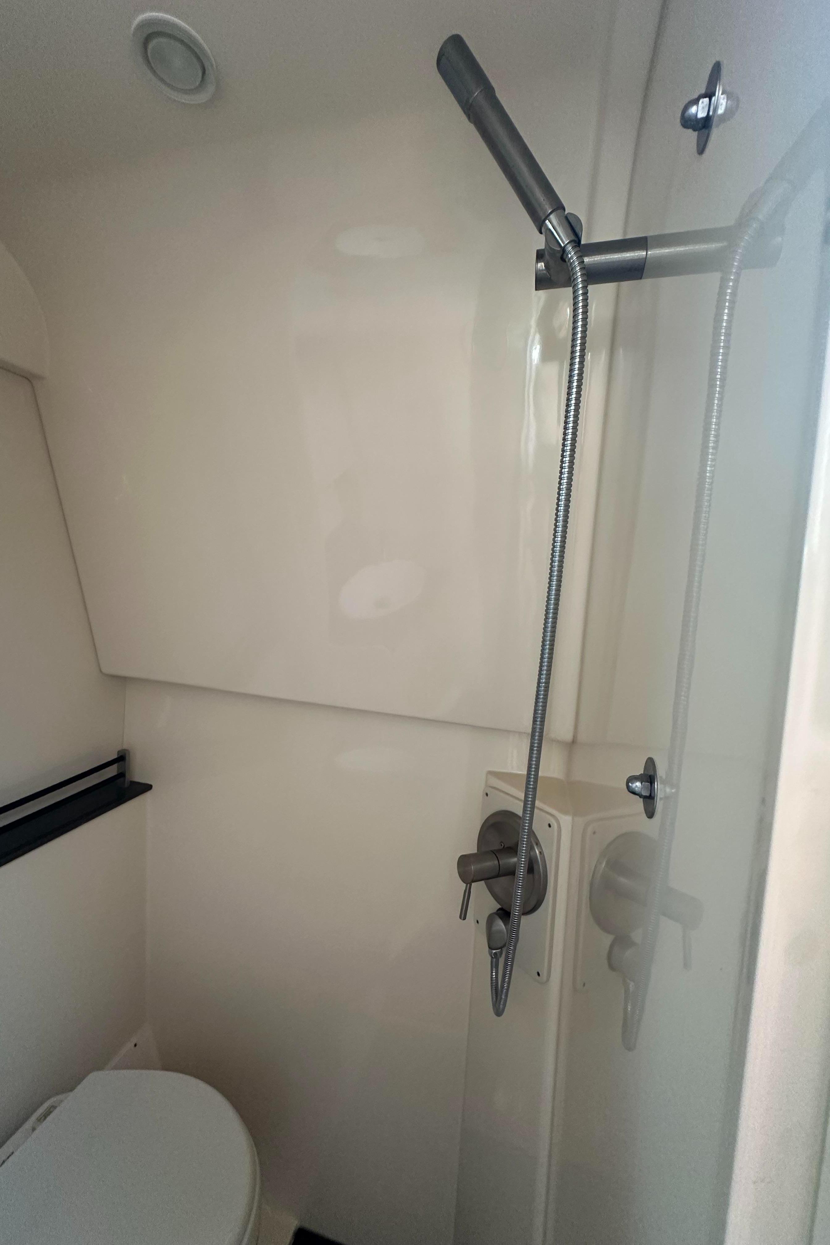 Shower area in 2013 Sea Ray 370 Venture boat, featuring modern fixtures and compact design.