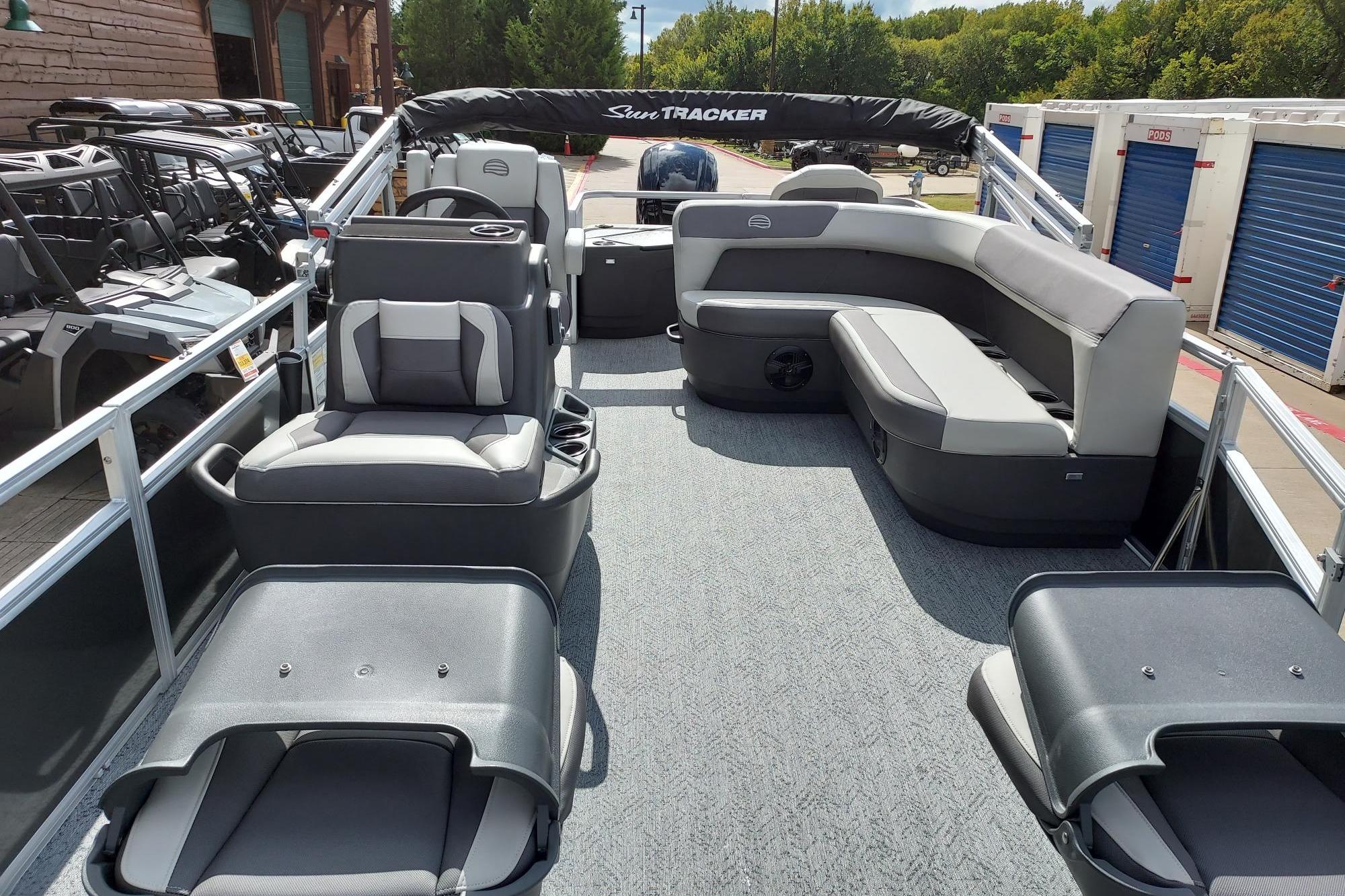 2026 Sun Tracker Bass Buggy 18 DLX pontoon boat with spacious seating and modern design.