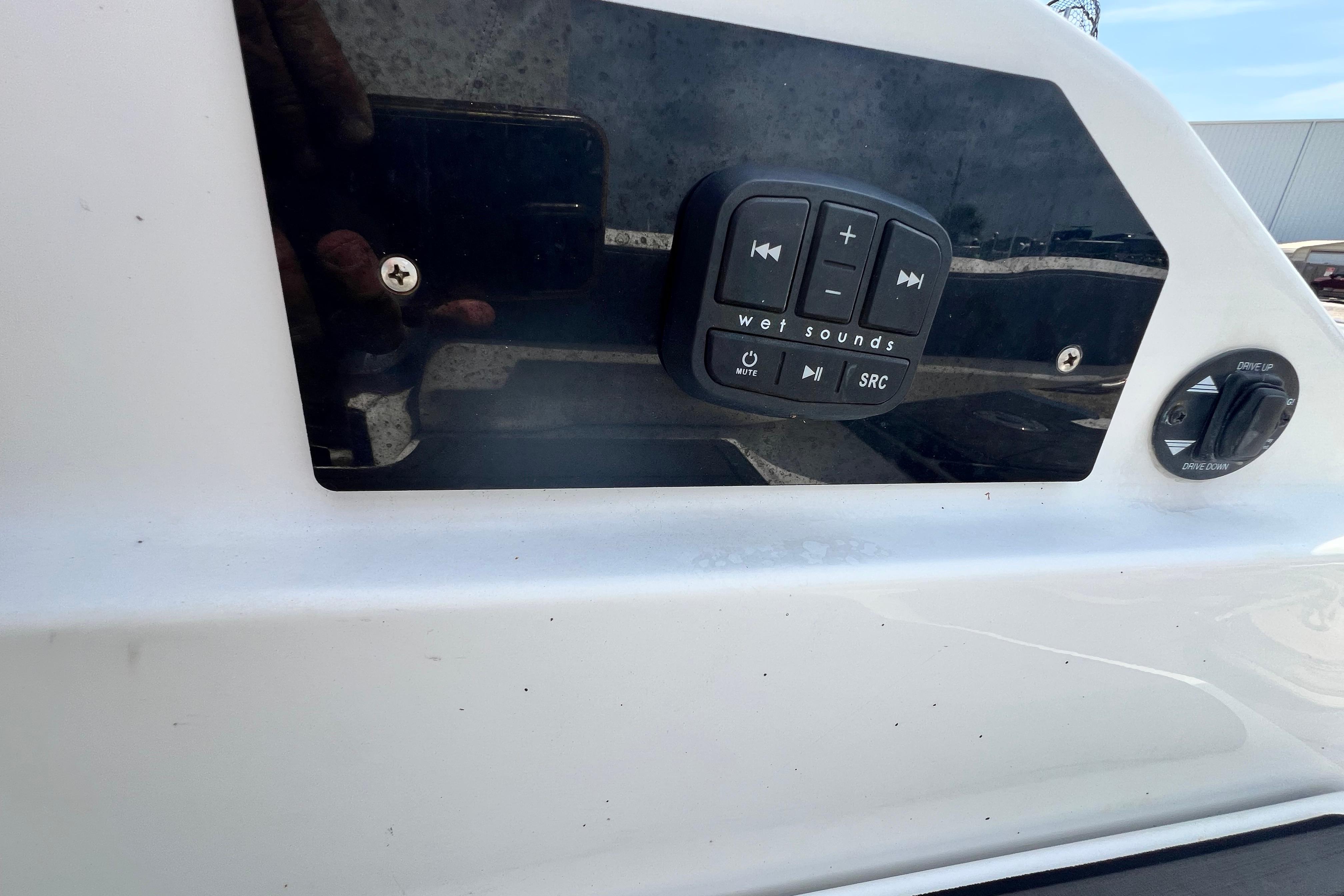 Control panel on a 2015 Monterey 268SS Super Sport boat with audio and drive controls.