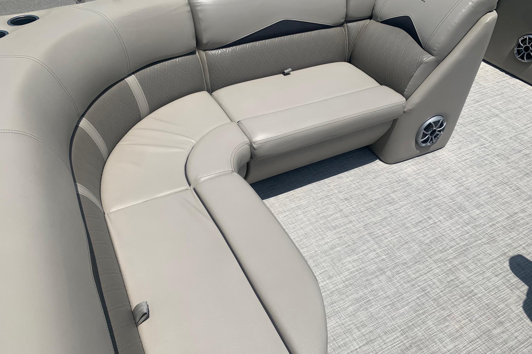 Luxurious seating on 2023 Silver Wave 2410 SW3 CLS boat, featuring premium upholstery and integrated speakers.