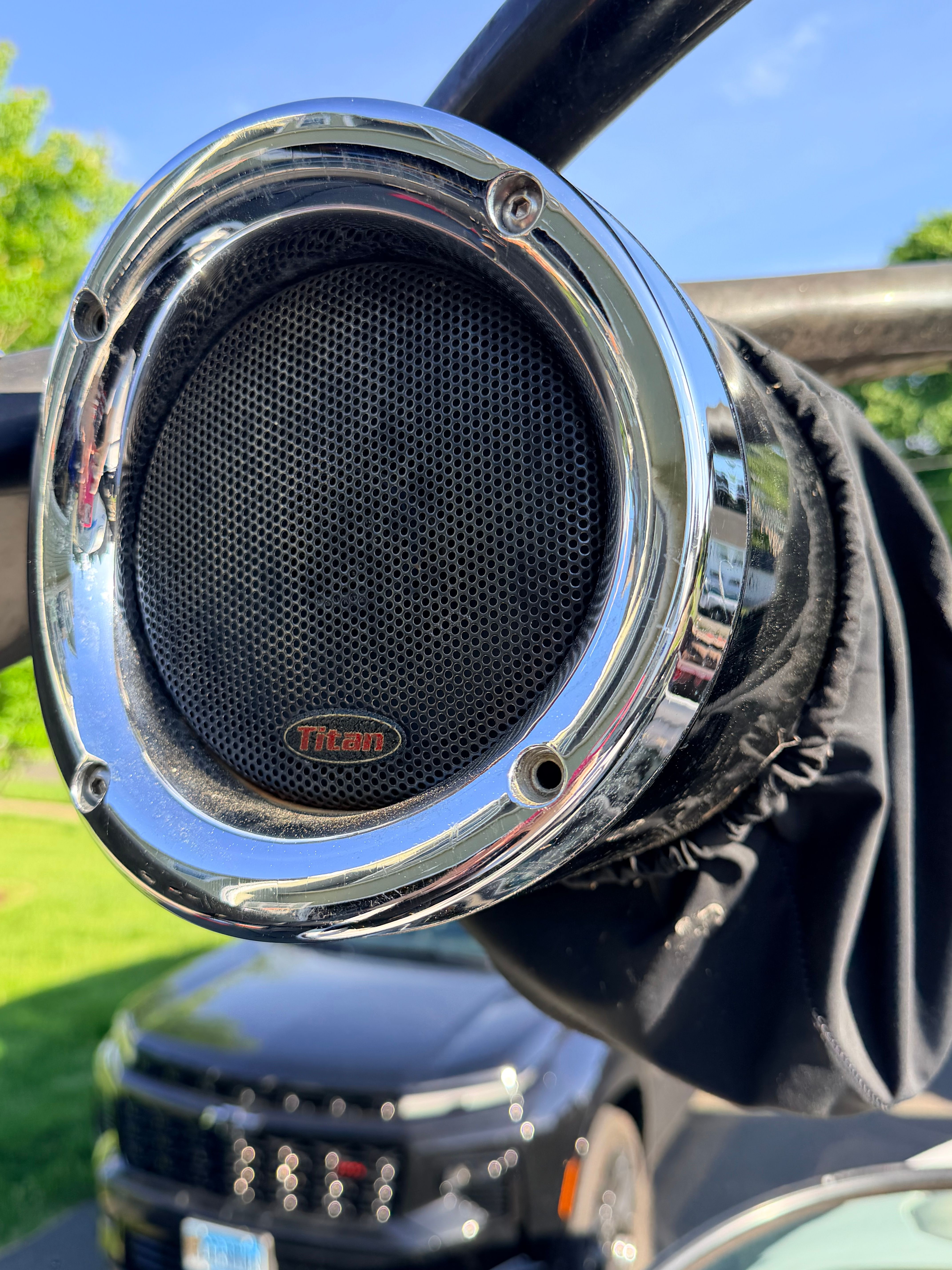 Titan speaker on 2006 Malibu iRide, shiny chrome frame.