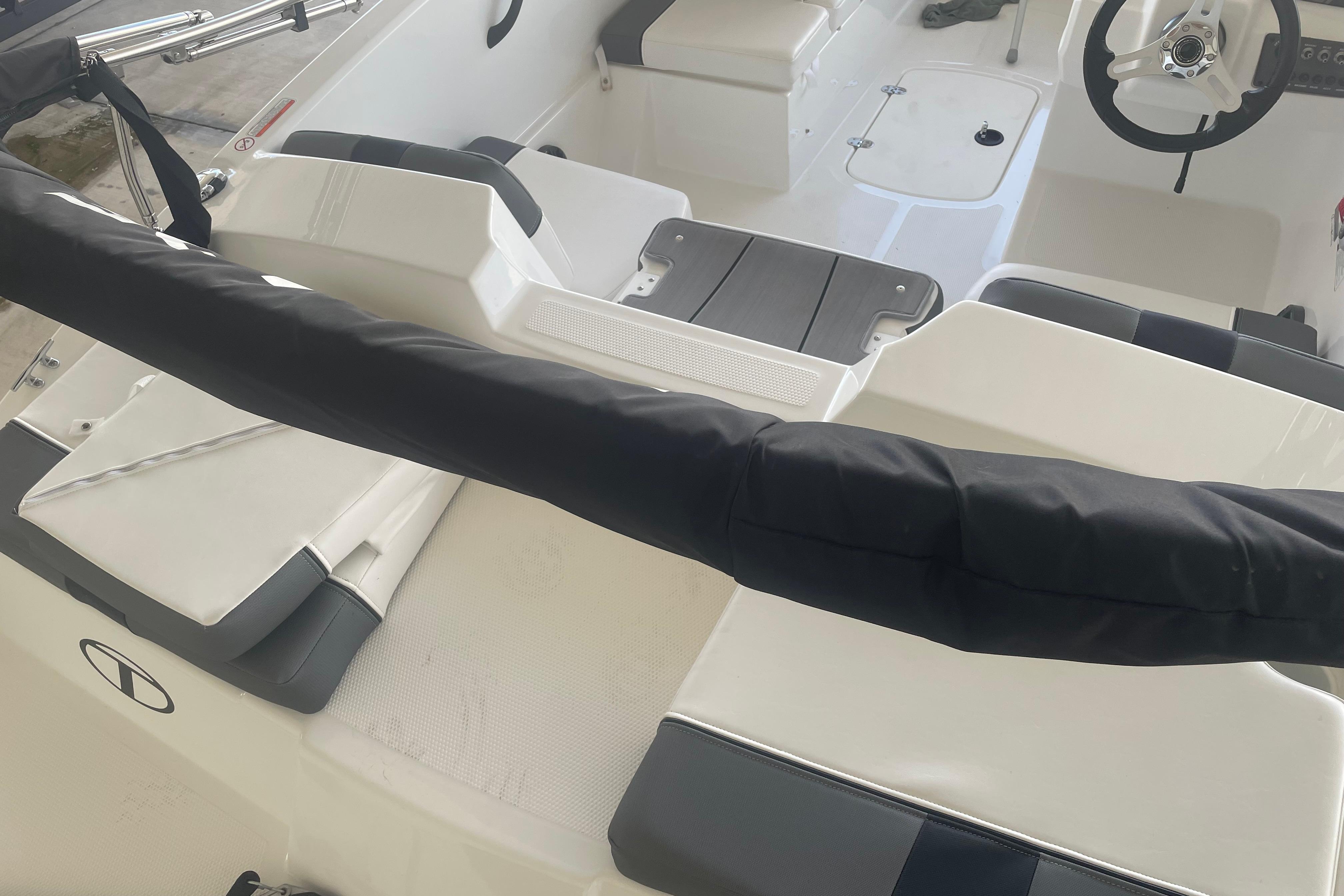 2026 Tahoe T16 boat interior with seating and steering wheel.