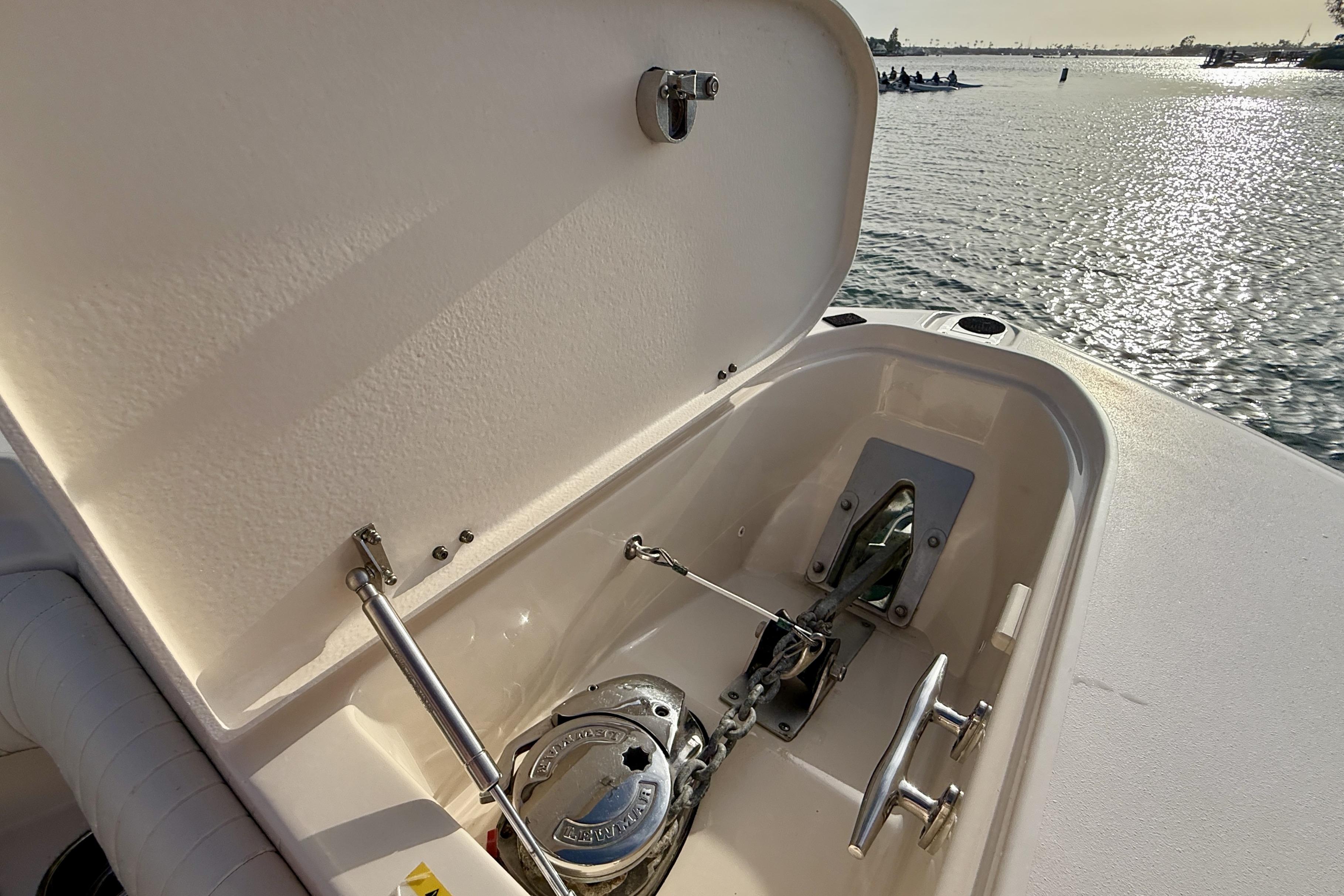 Anchor compartment of 2012 Grady-White Canyon 336 boat on water.