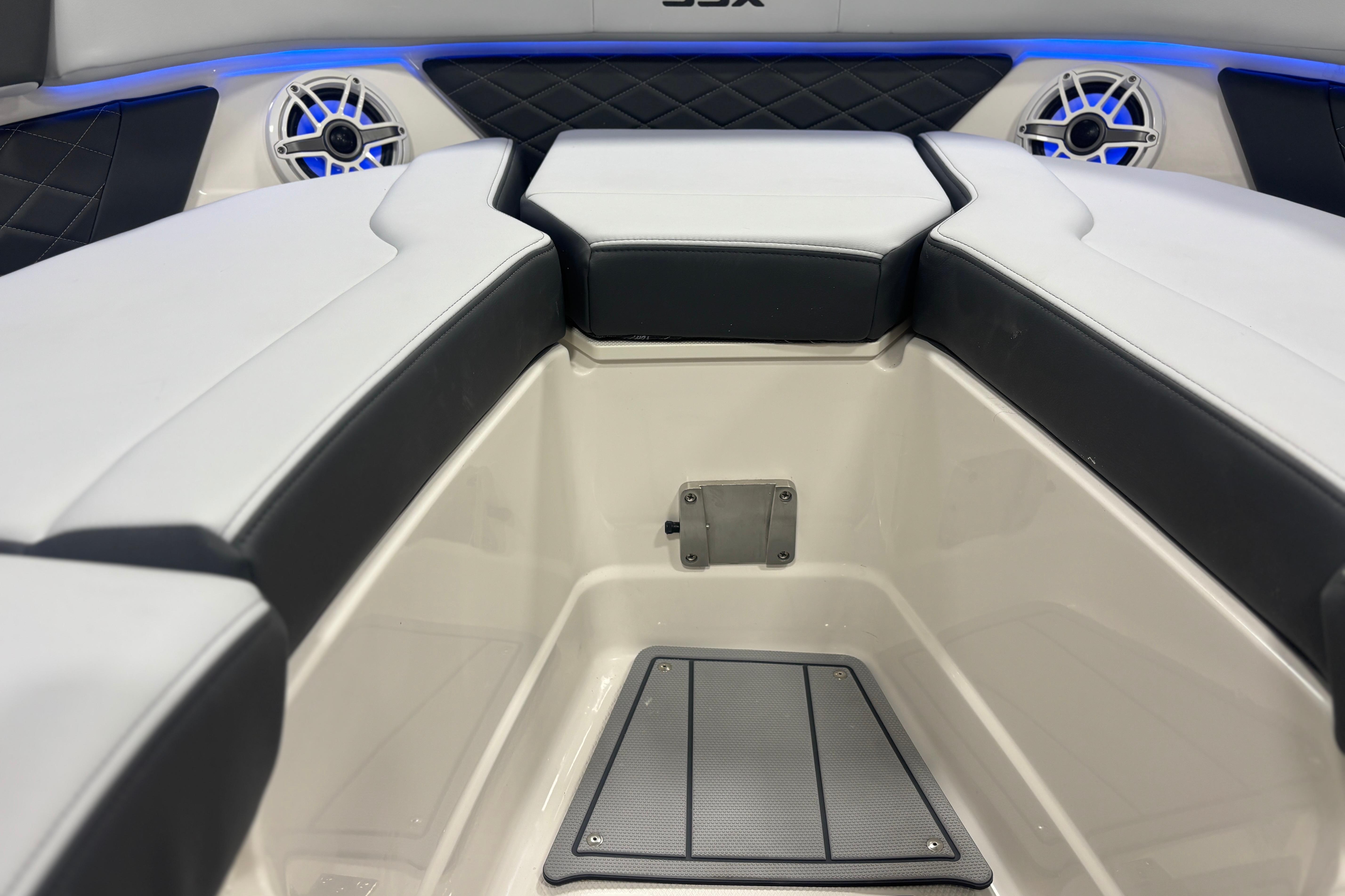 2026 Chaparral SSX 30 boat interior with cushioned seating and built-in speakers.