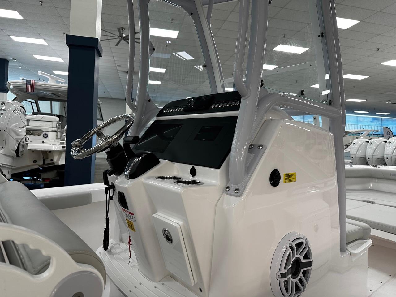 2023 Everglades 243 Center Console boat interior with steering wheel and control panel.